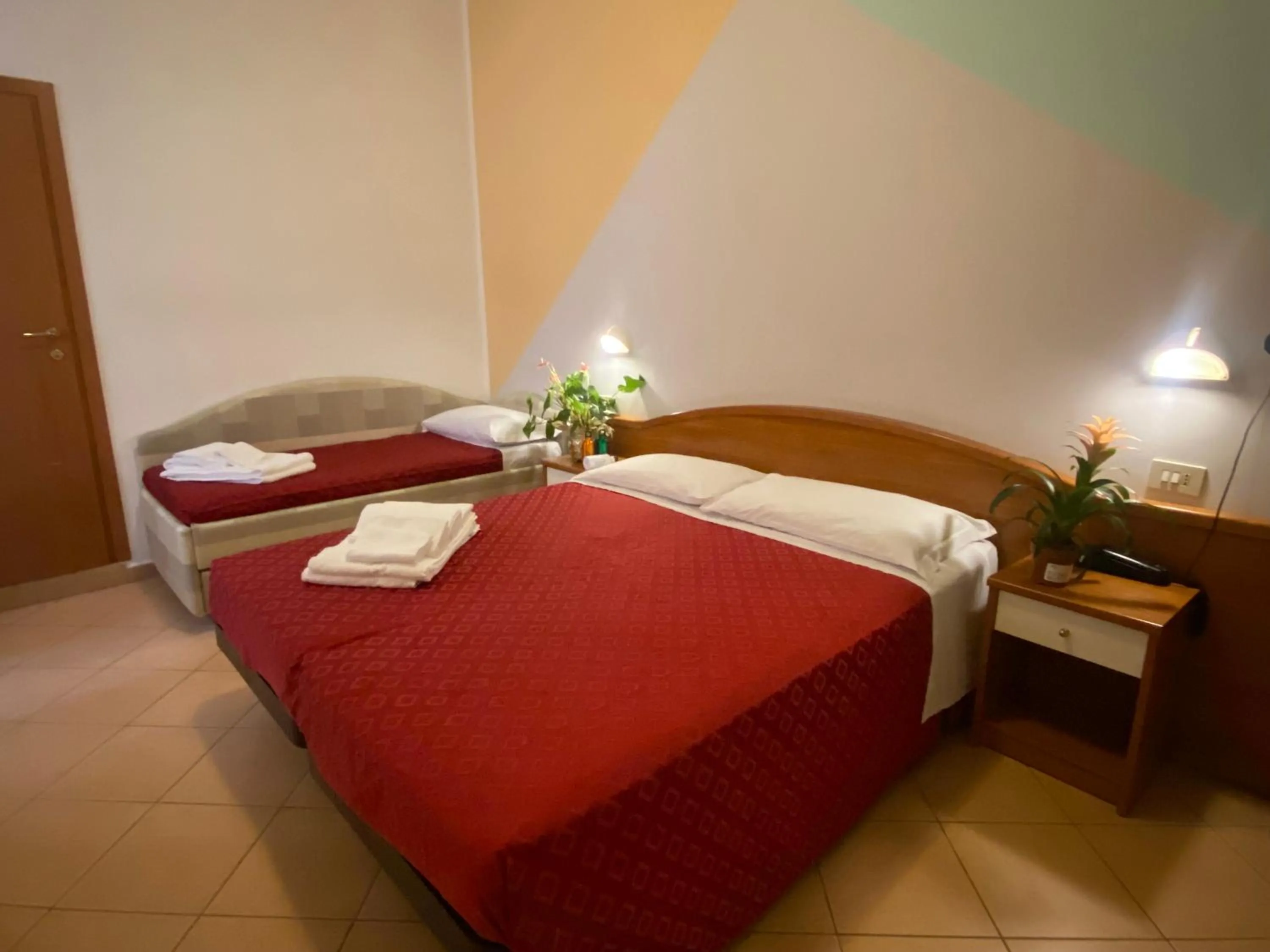 Bed in Hotel Villa Caterina