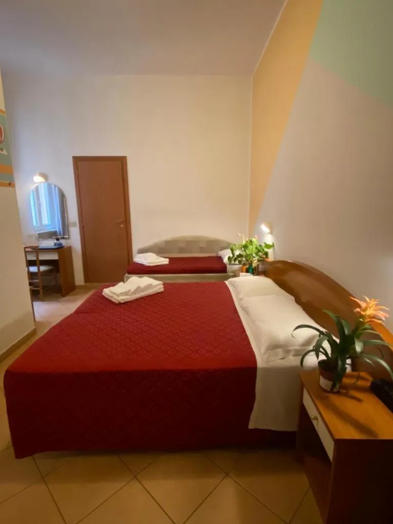 Bed in Hotel Villa Caterina