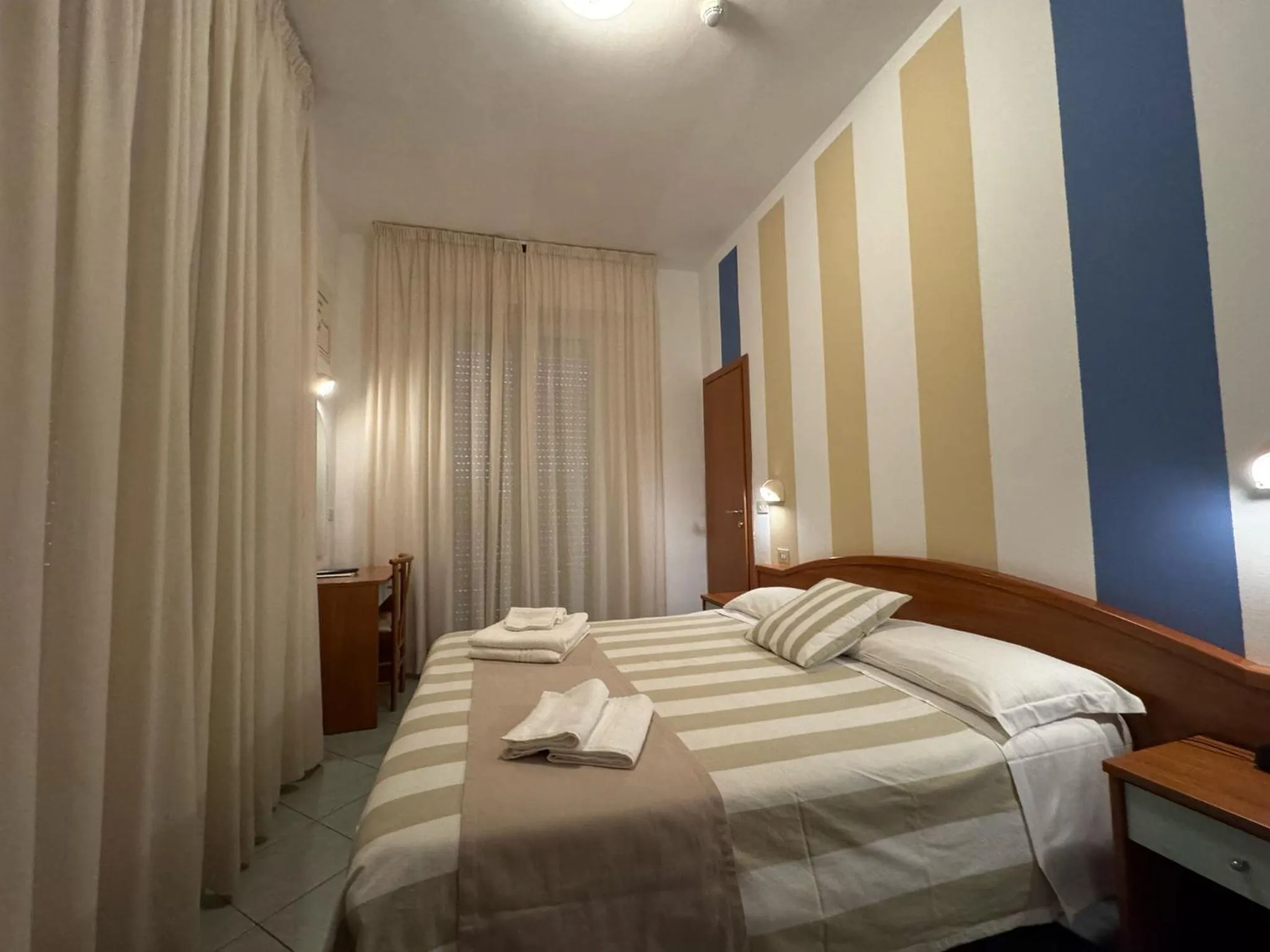 Bed in Hotel Villa Caterina