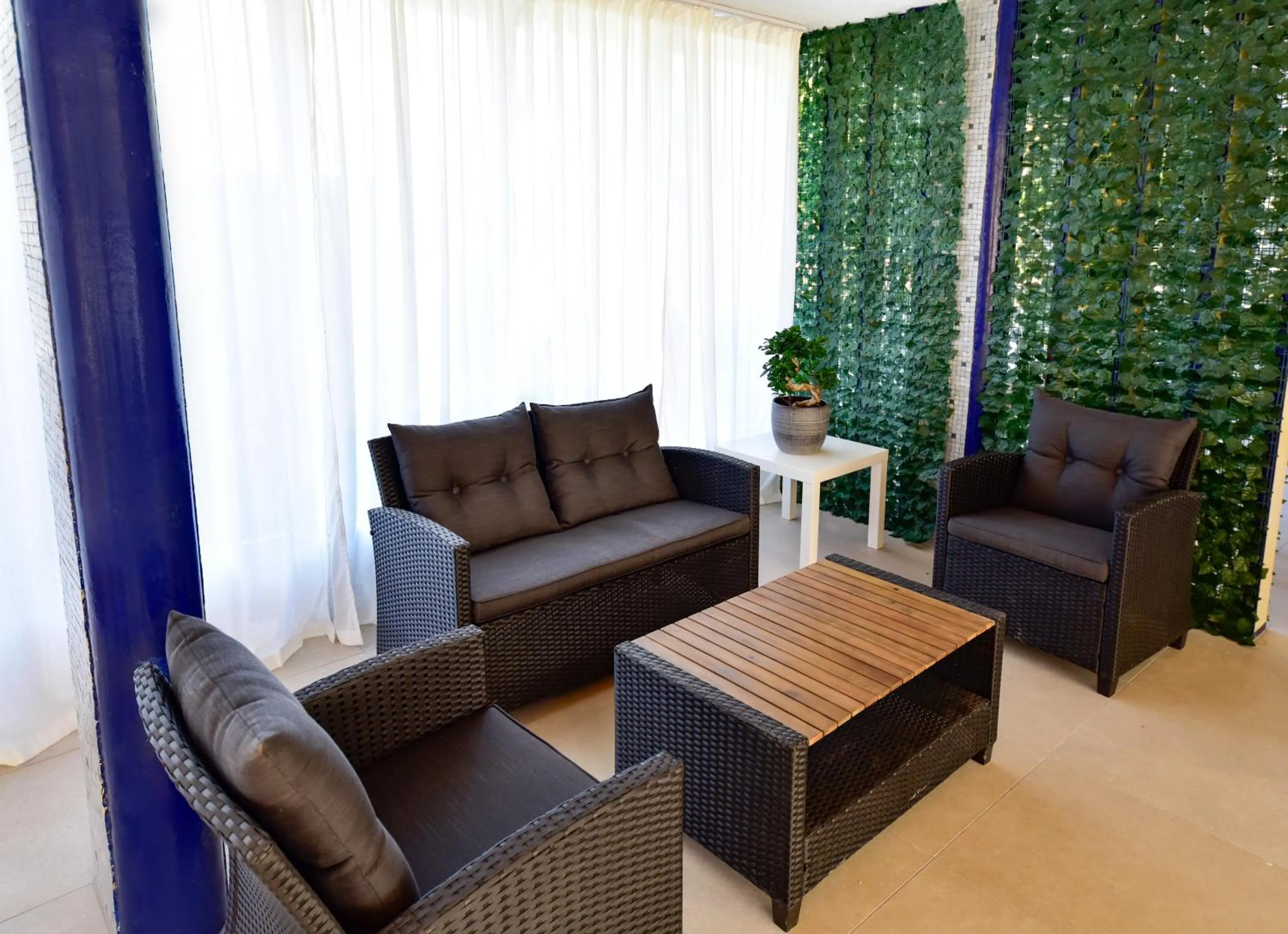 Seating area in Zama Hotel
