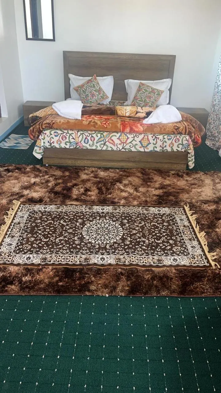 Bed in Al Mubeen home stay
