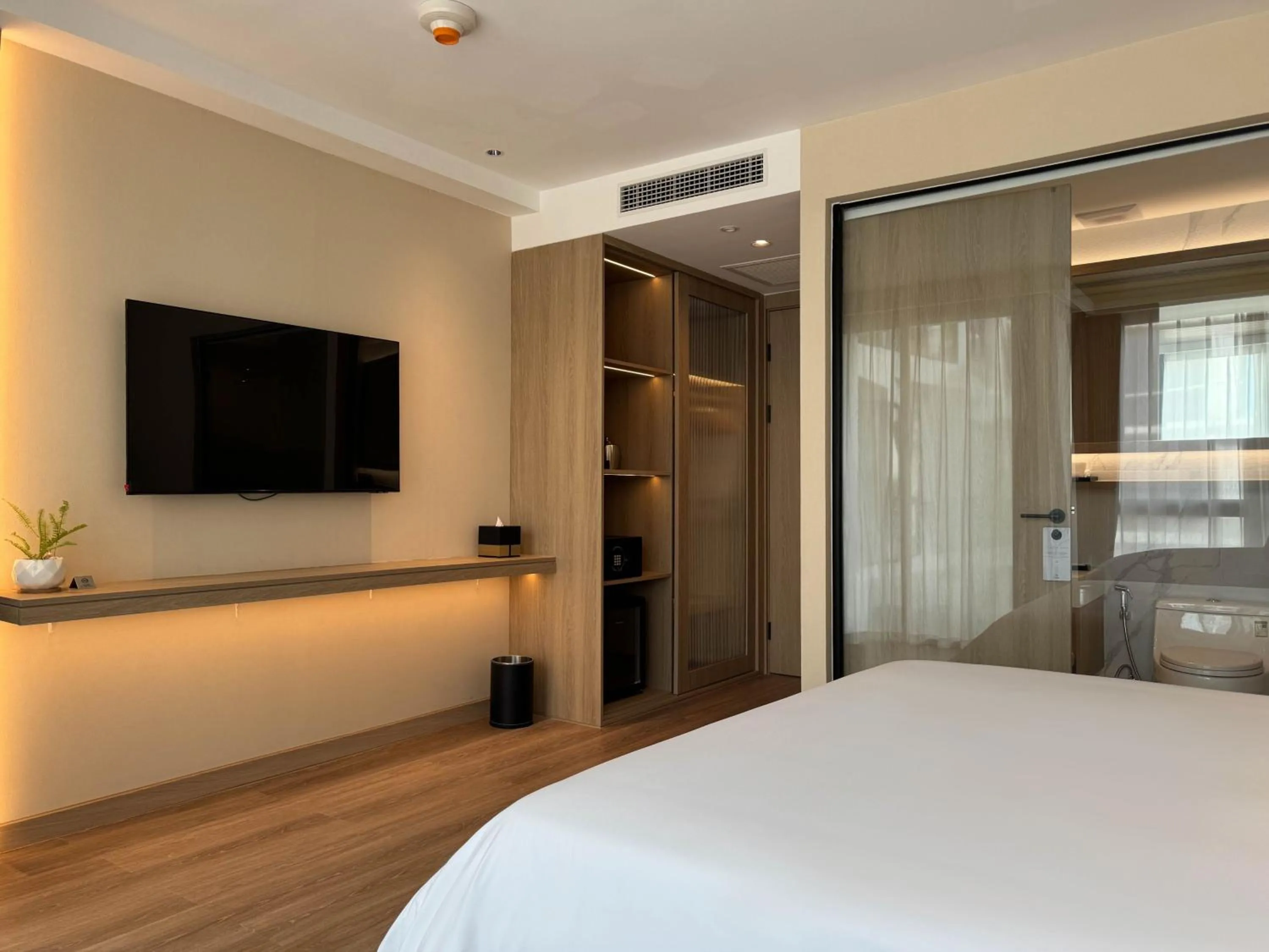 Bed in Laya Suites and Residences