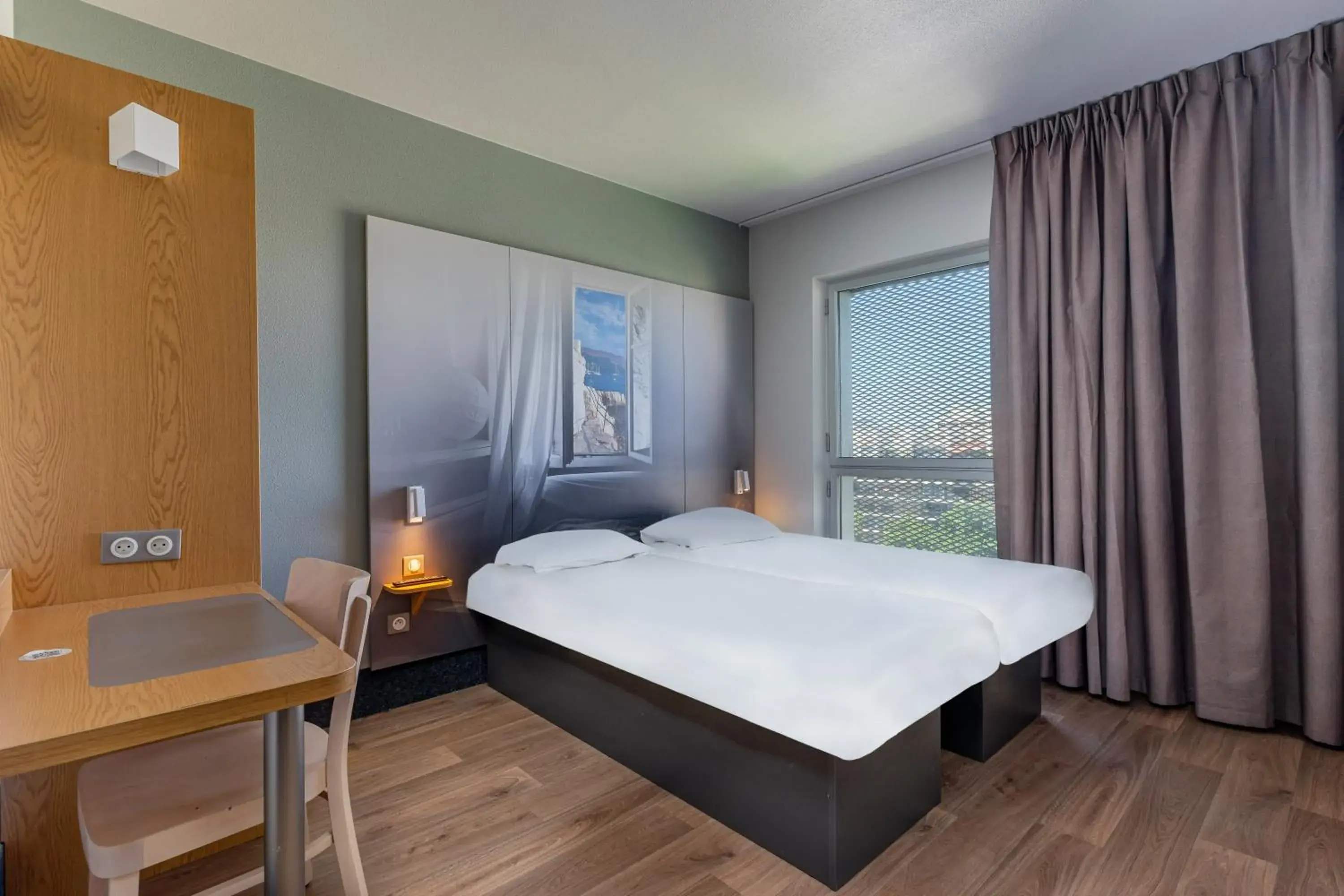 Photo of the whole room, Bed in B&B HOTEL Marseille Euromed Photo of the whole room, Bed in B&B HOTEL Marseille Euromed