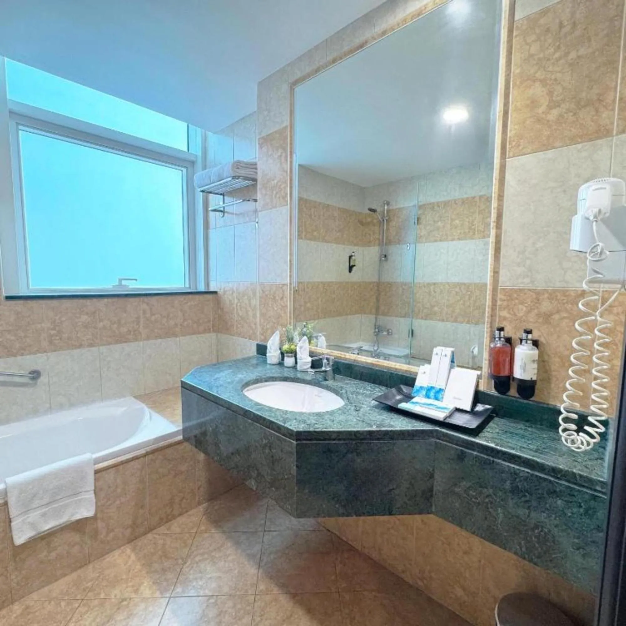 Bathroom in Emirates Grand Hotel Opposite DIFC