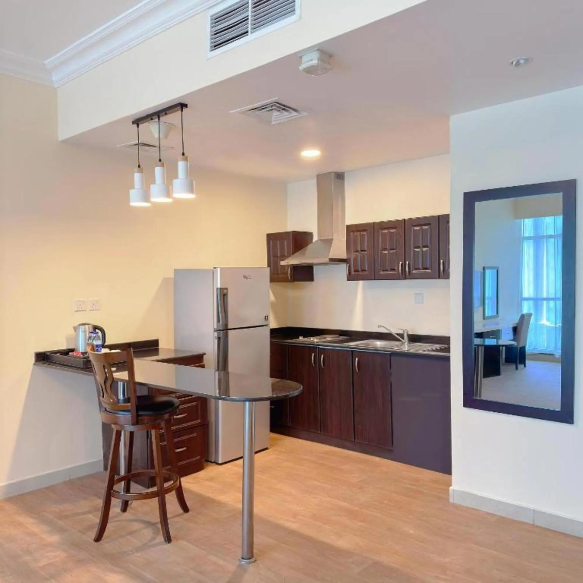 Kitchen or kitchenette in Emirates Grand Hotel Opposite DIFC