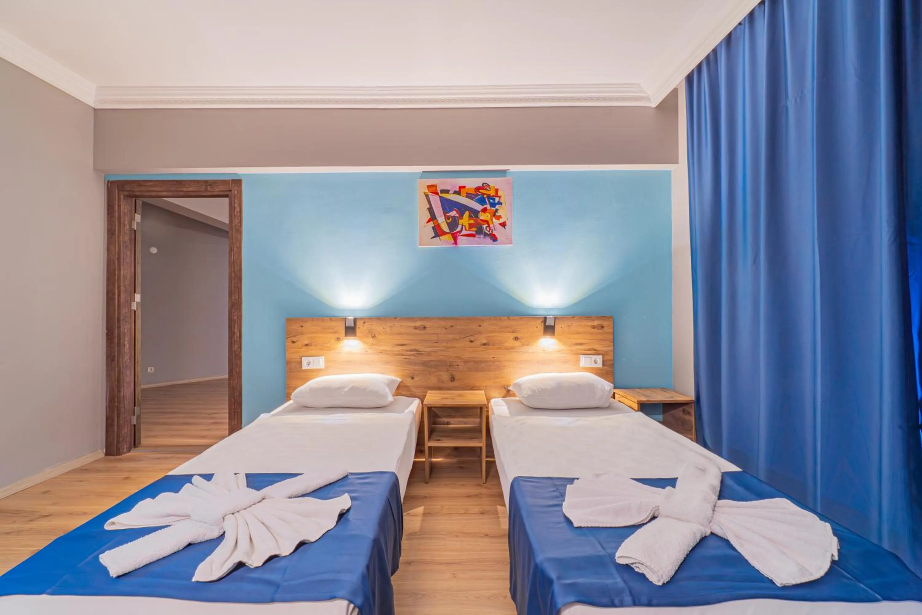 Bed in Pyxis Point Hotel - All Inclusive