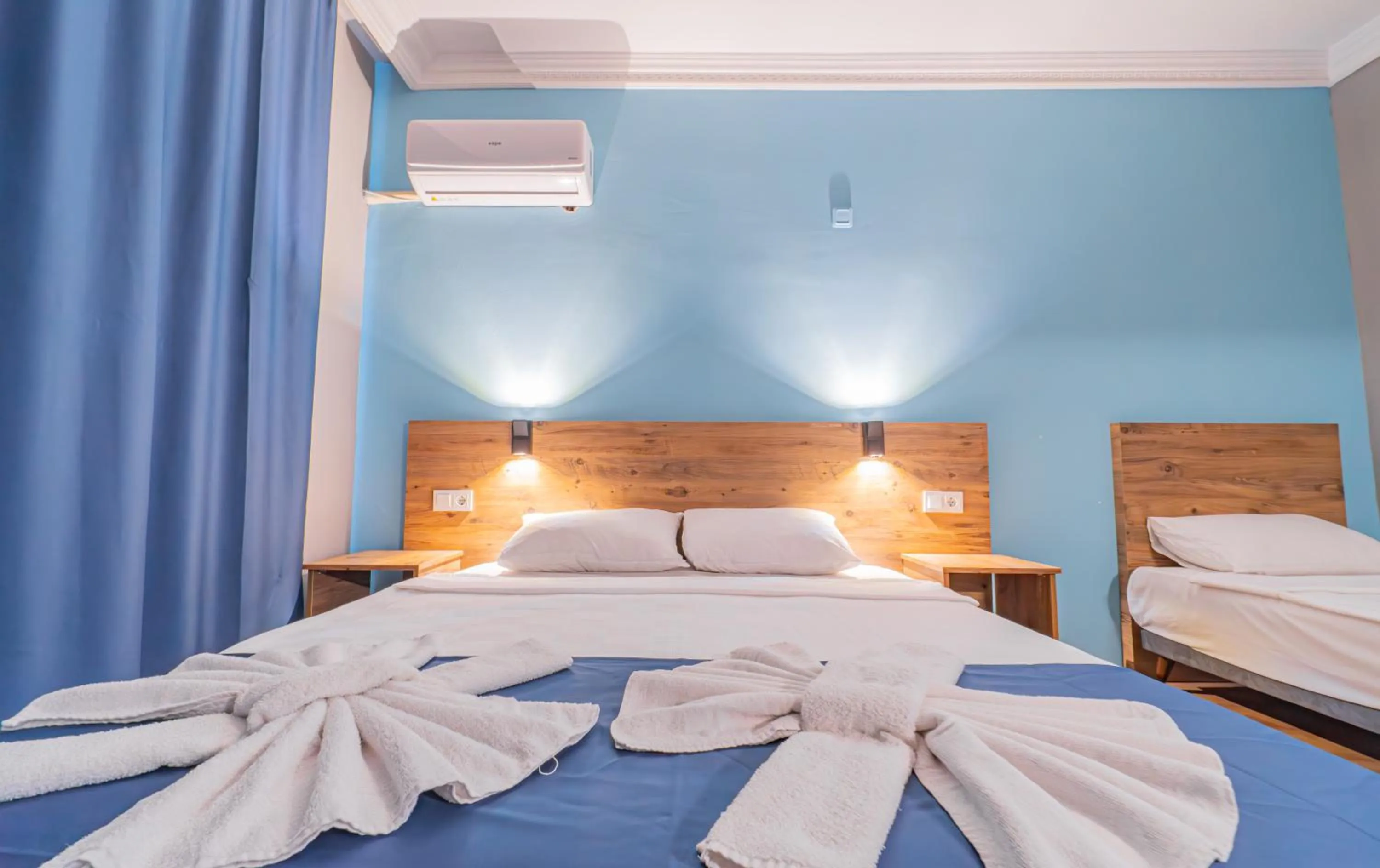 Bed in Pyxis Point Hotel - All Inclusive