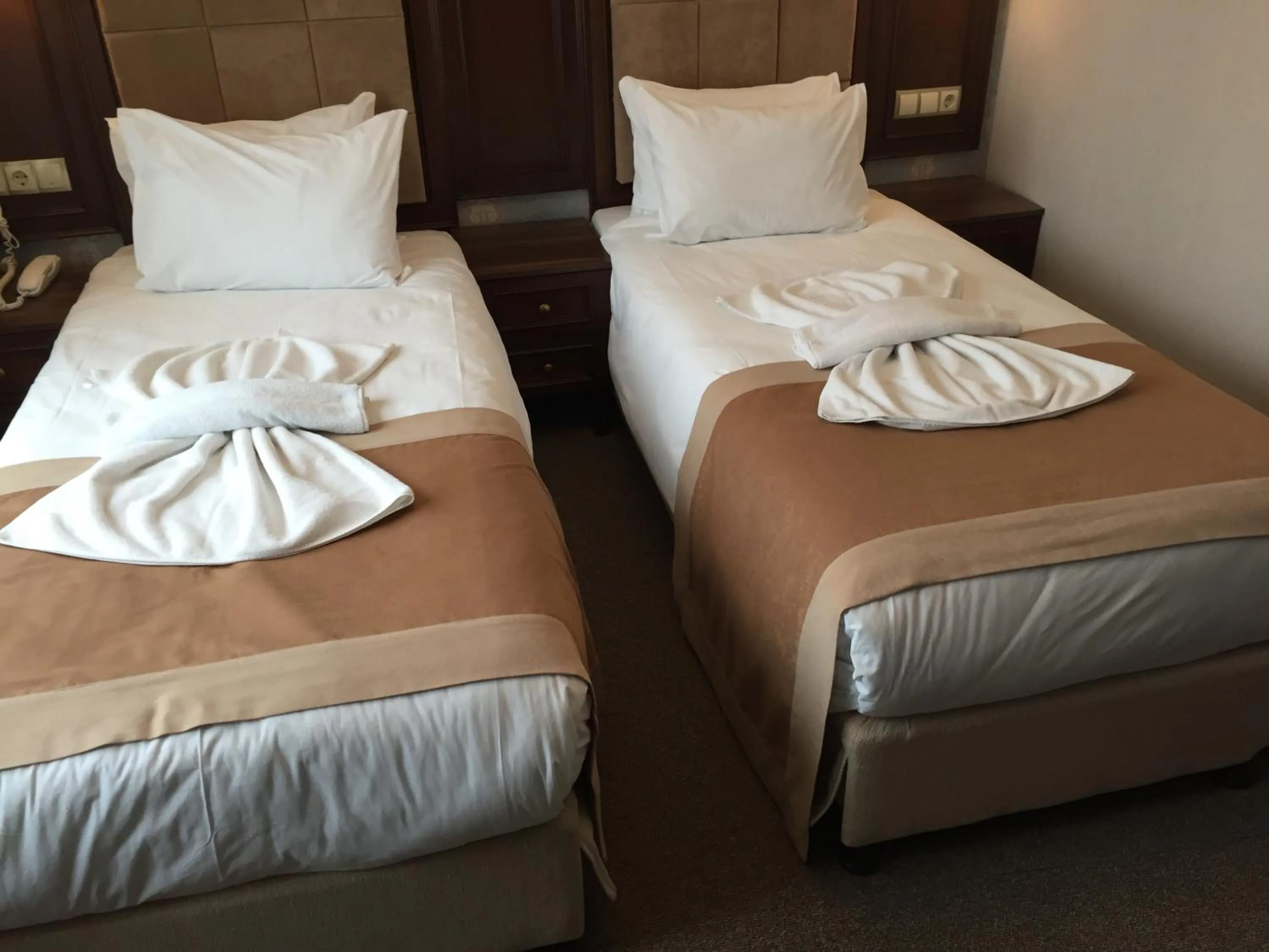 Bed in Golden Pen Hotel