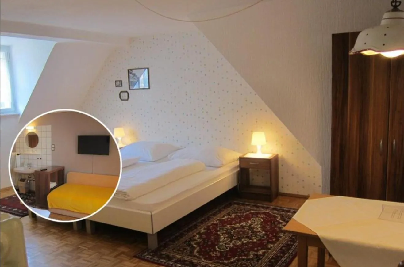 Deluxe Room (2 Adults + 1 Child) in Pension Sonne Bed