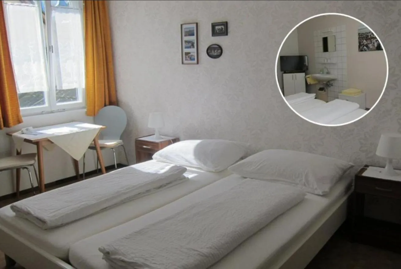 Double Room with Shared Bathroom in Pension Sonne Bed