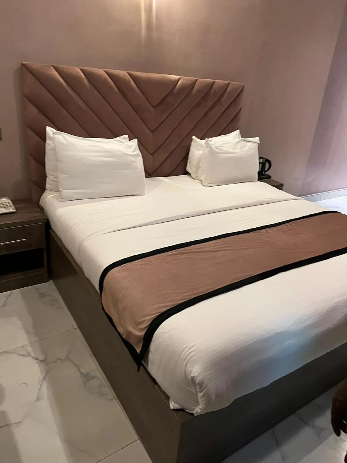 Bed in La VOD Hotel