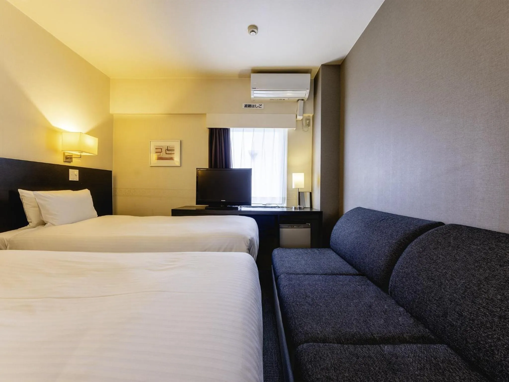 Photo of the whole room, Bed in KOKO HOTEL Yokohama Tsurumi