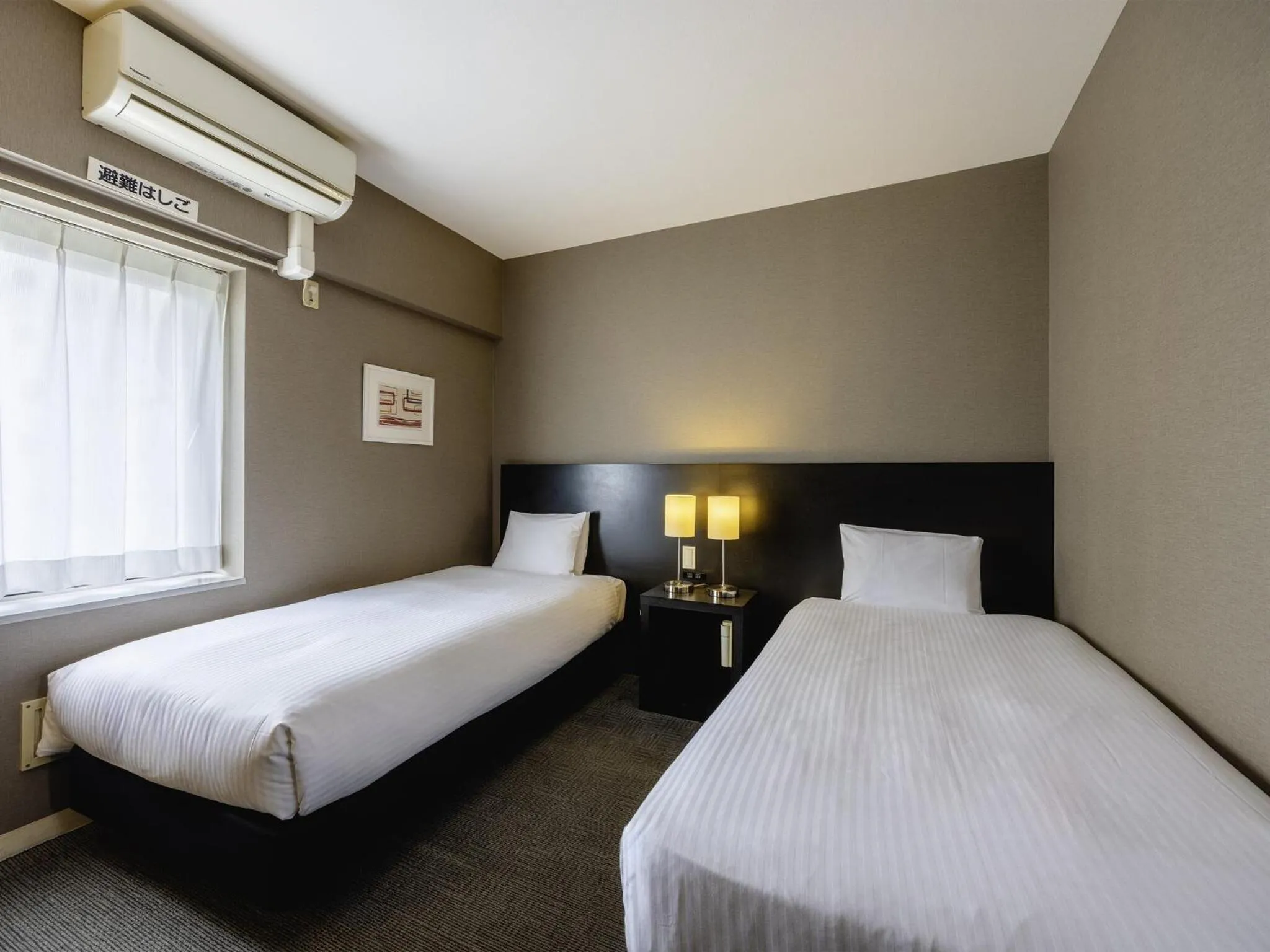 Photo of the whole room, Bed in KOKO HOTEL Yokohama Tsurumi