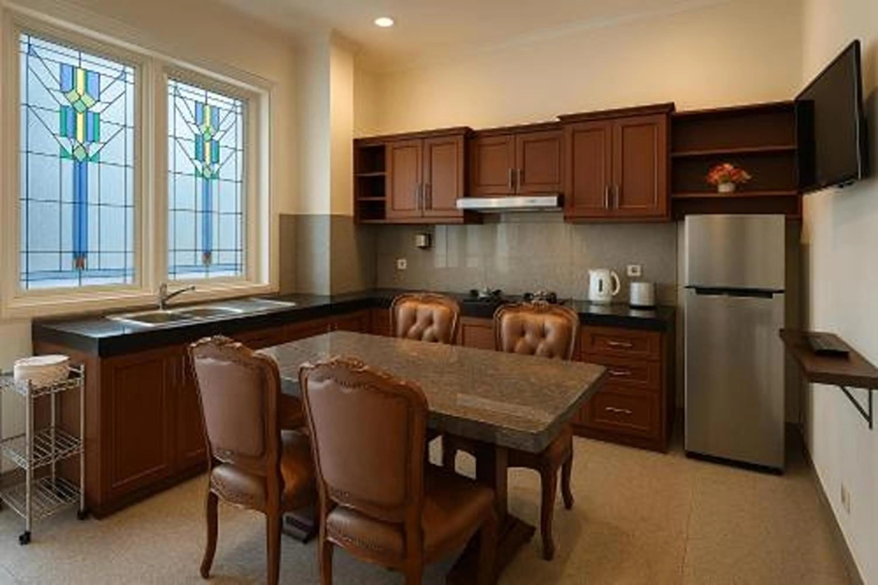 Kitchen or kitchenette in Cipto Apartment