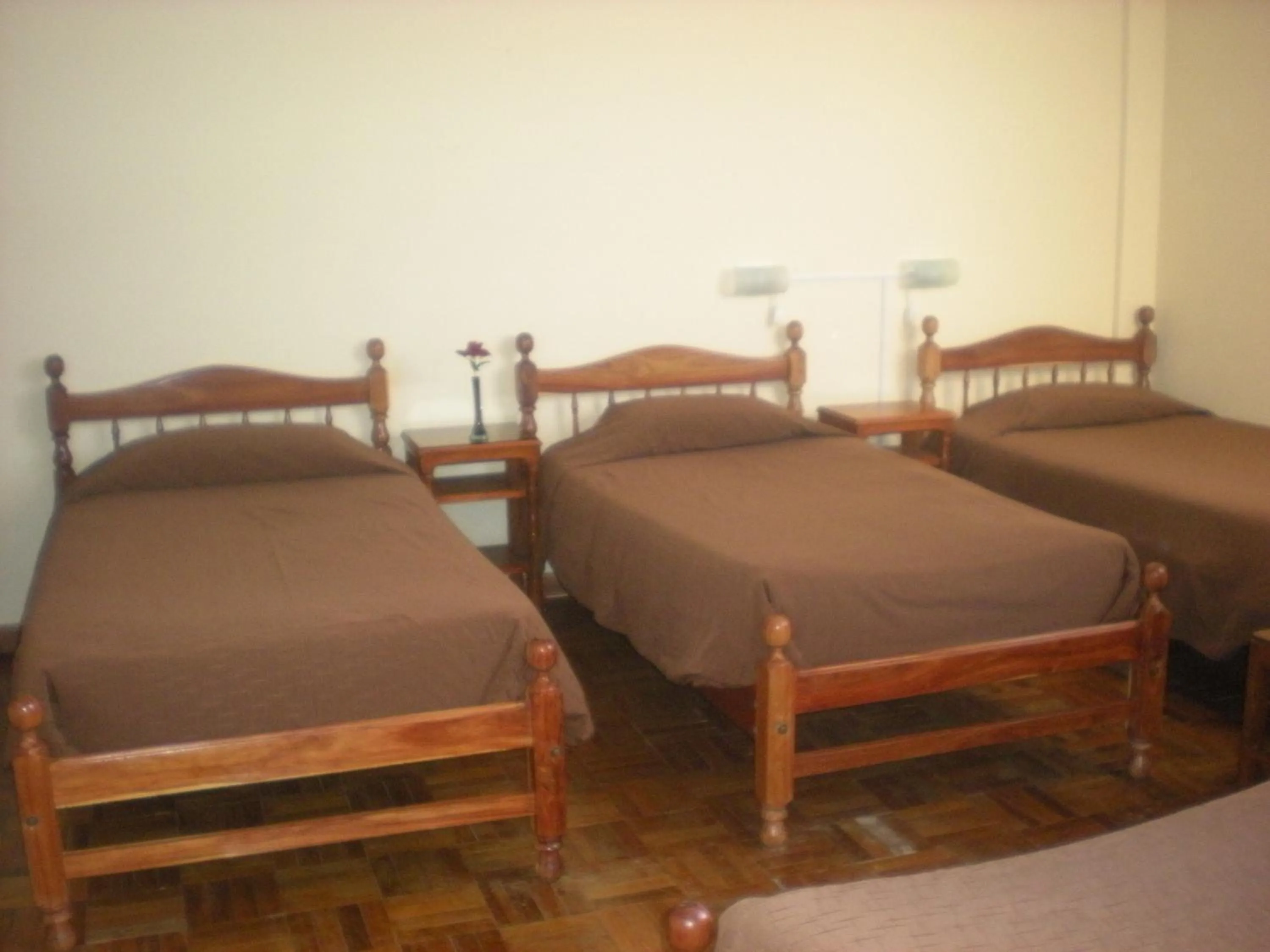 Bed in Julia Plaza Hotel