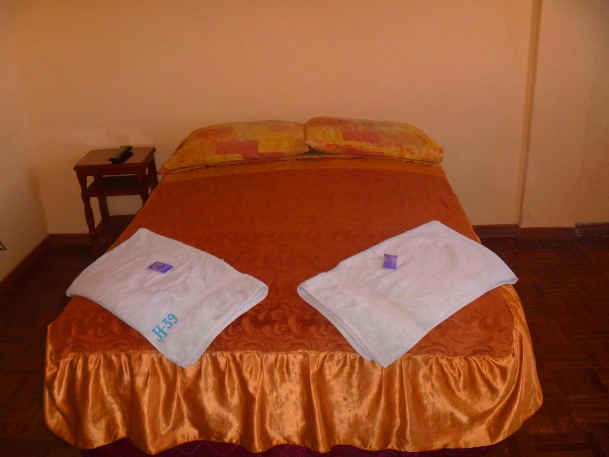 Bed in Julia Plaza Hotel