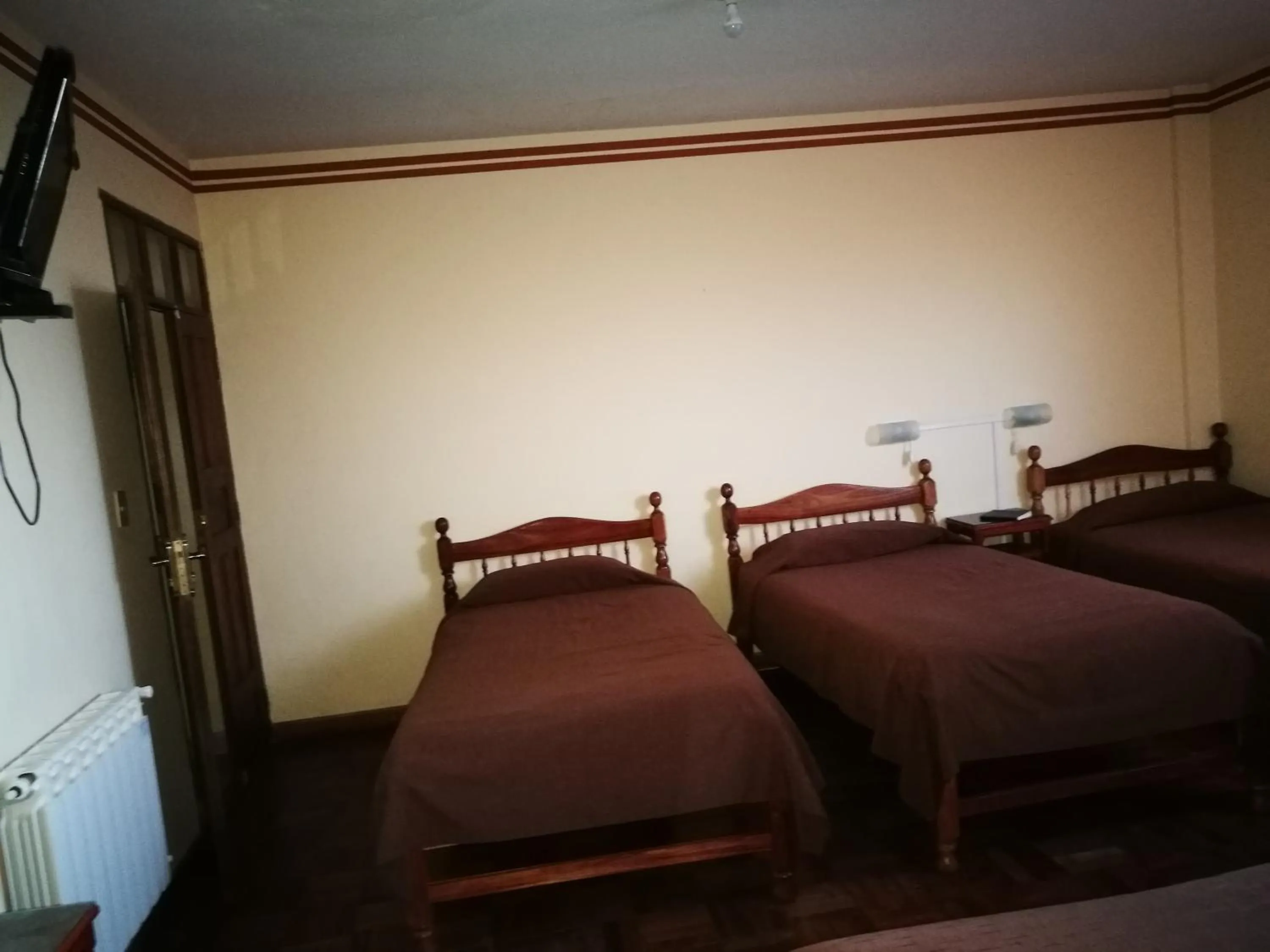 Bed in Julia Plaza Hotel