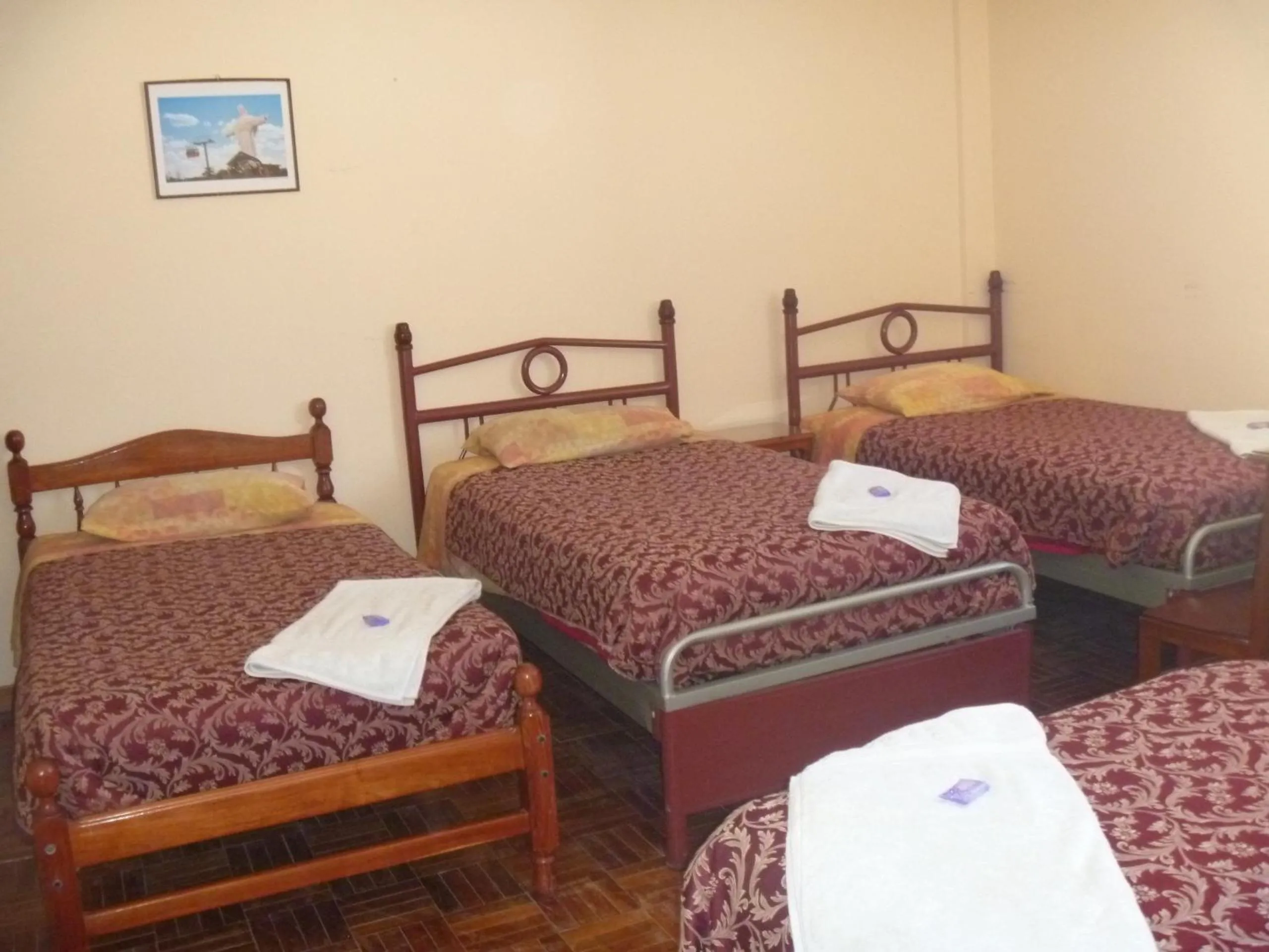 Bed in Julia Plaza Hotel