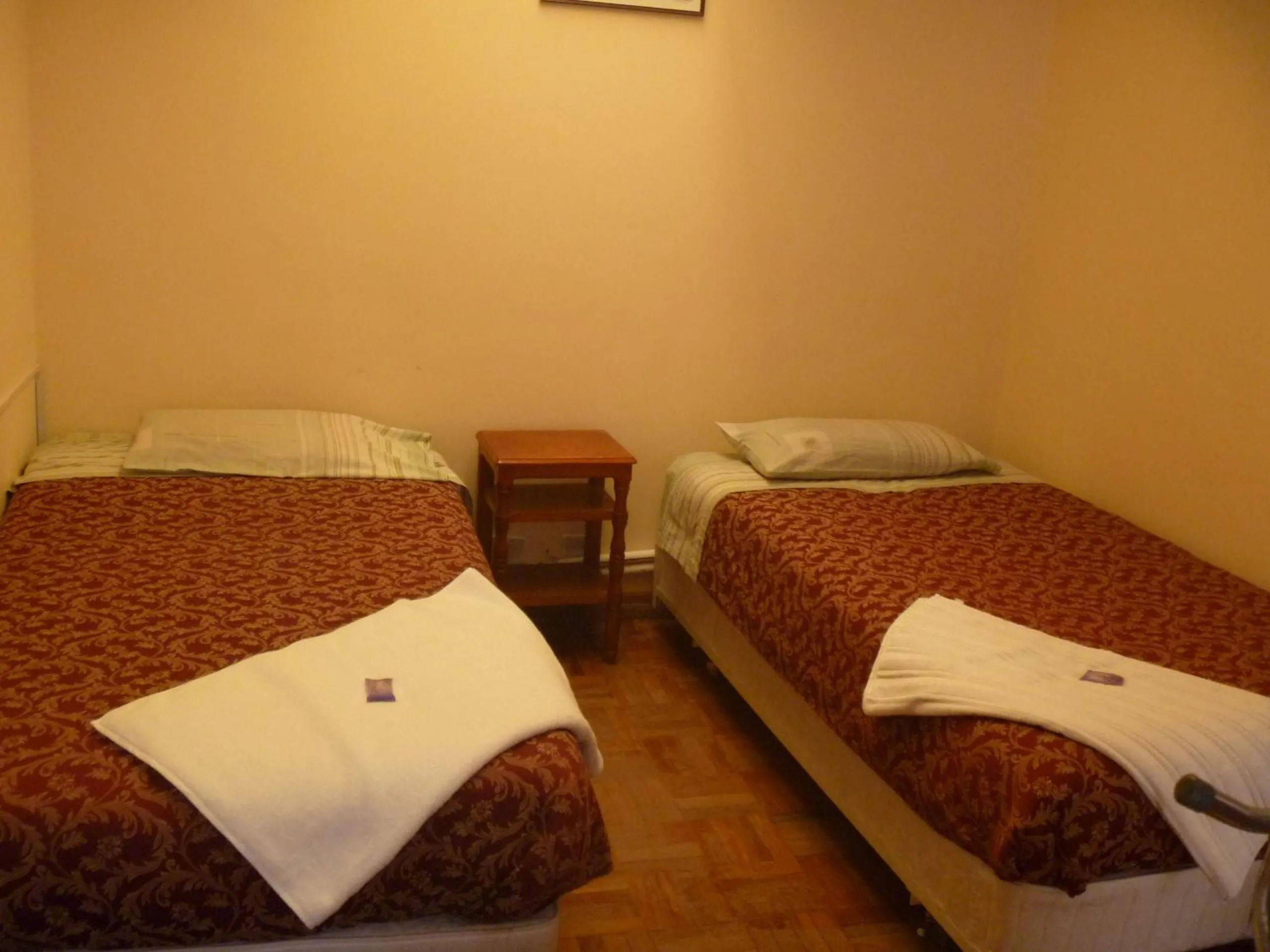 Bed in Julia Plaza Hotel