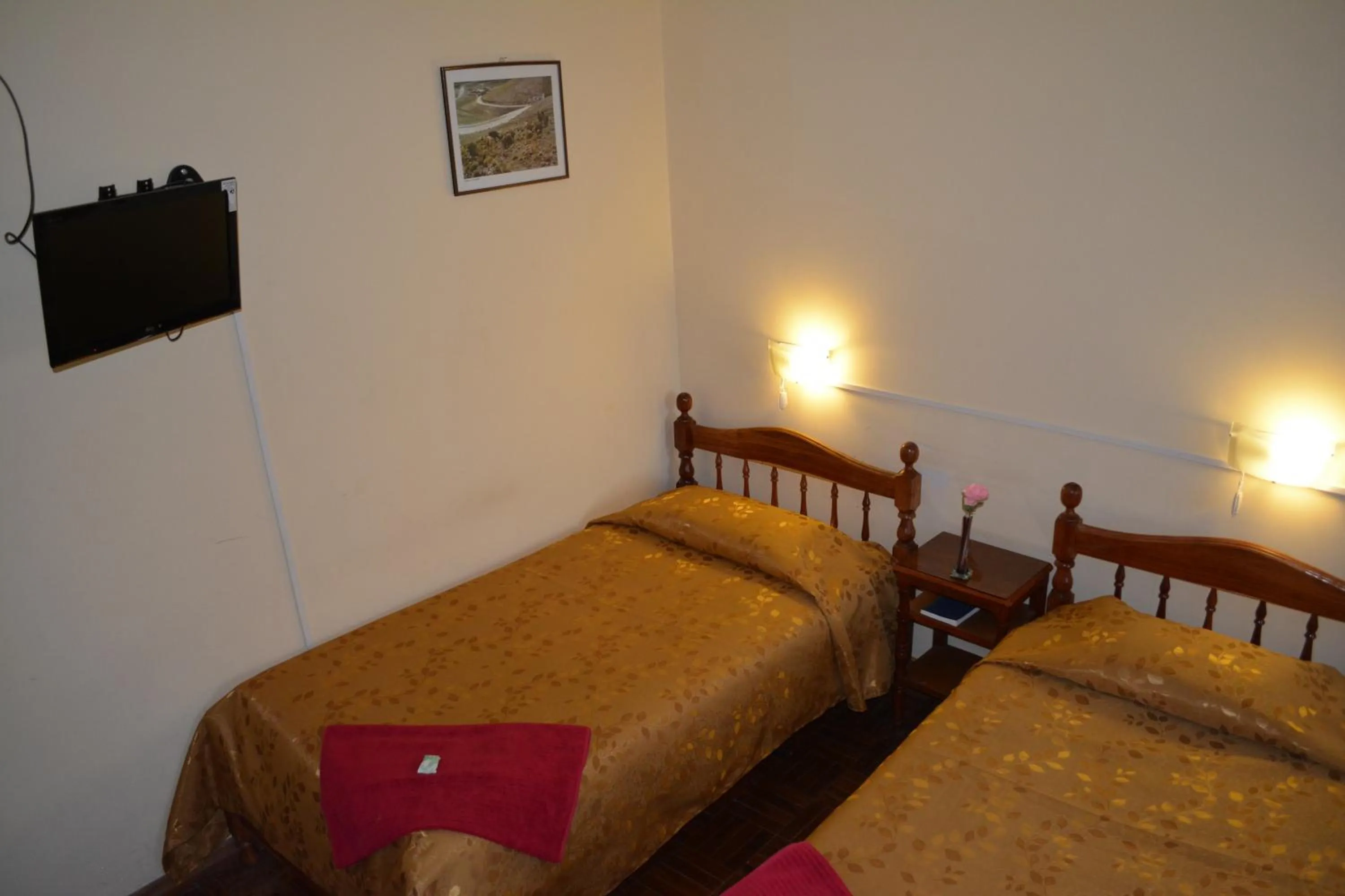 Bed in Julia Plaza Hotel