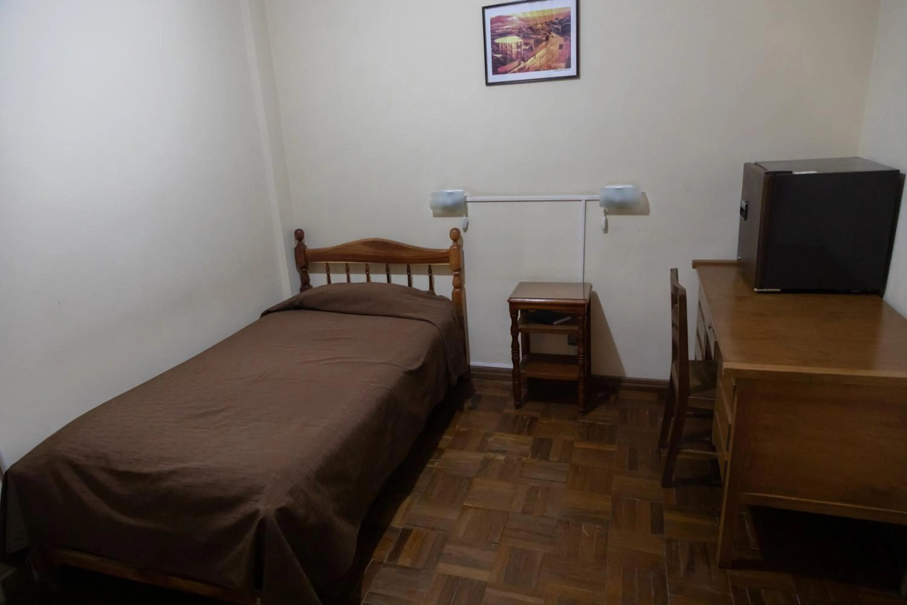 Bed in Julia Plaza Hotel