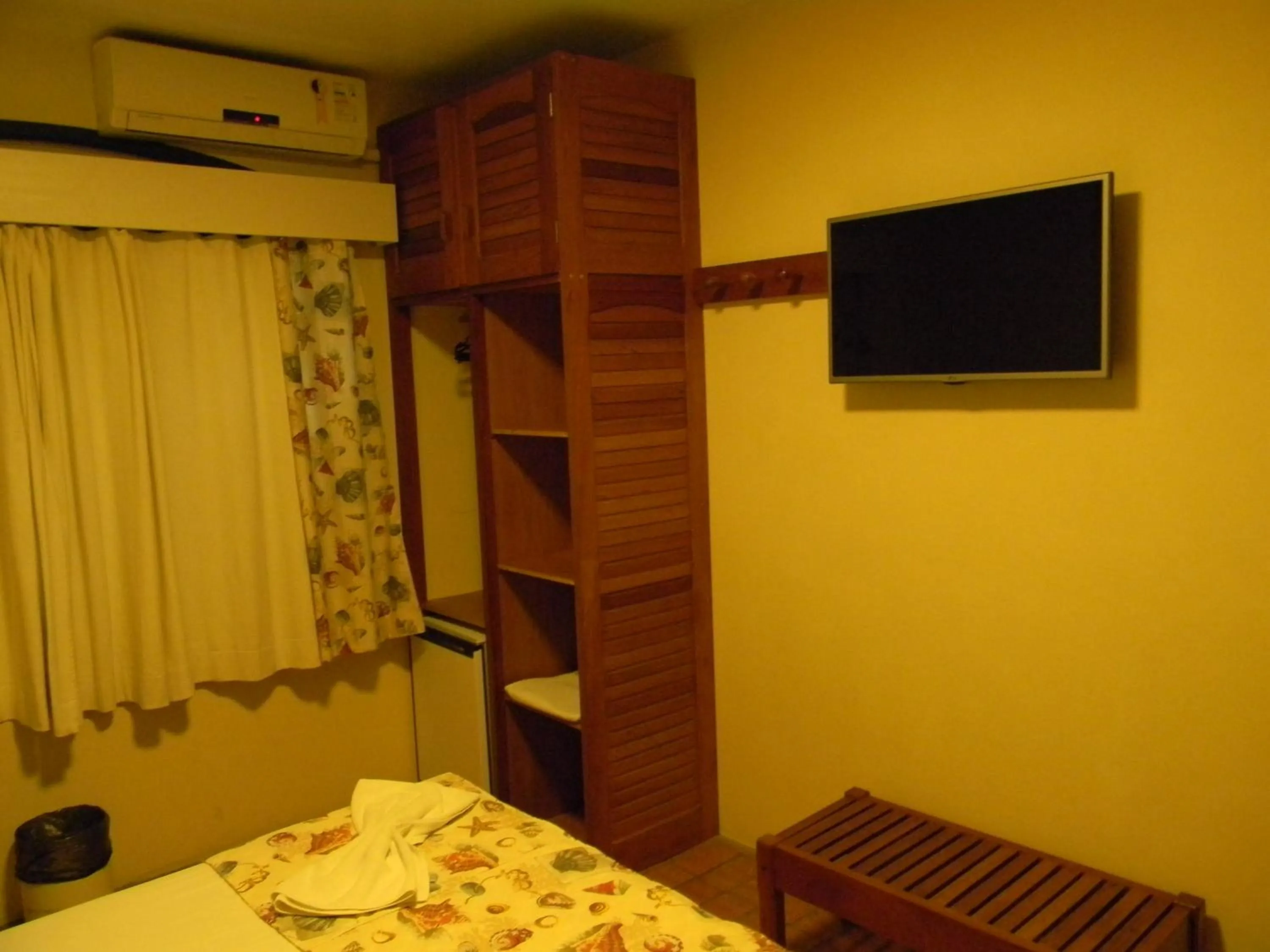 Bed in Pousada Recanto da Prainha