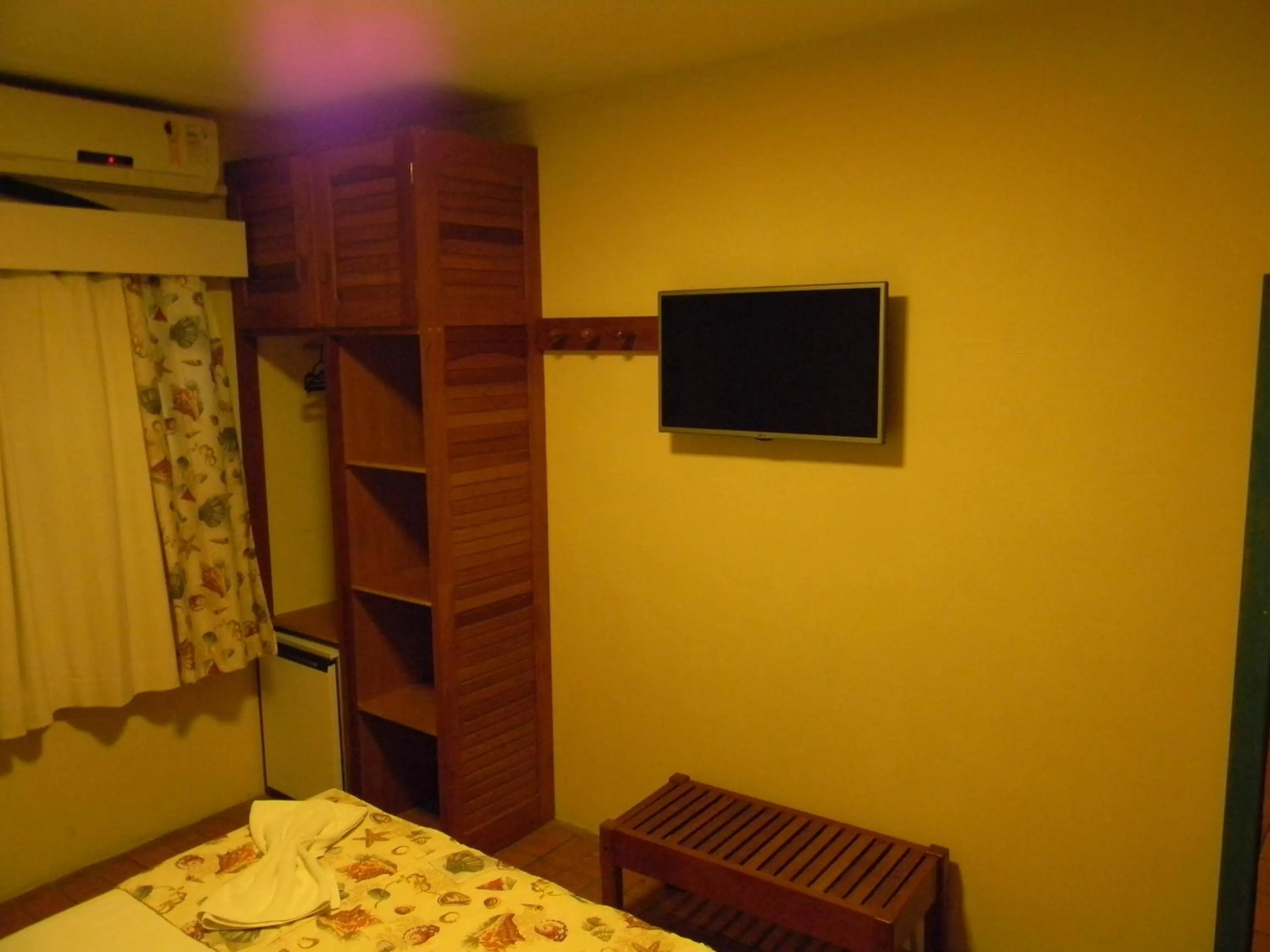 Bed in Pousada Recanto da Prainha