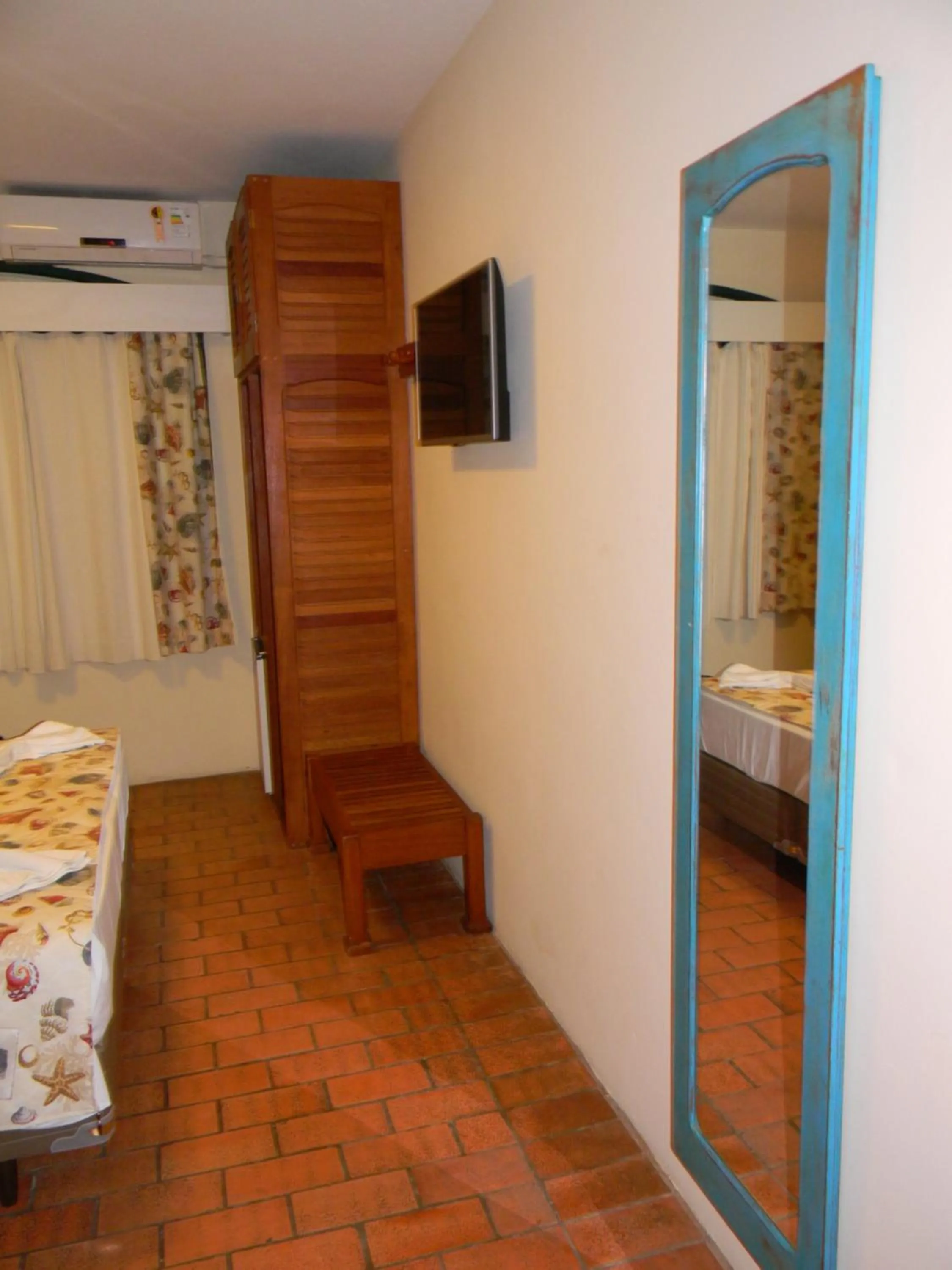 Bed in Pousada Recanto da Prainha