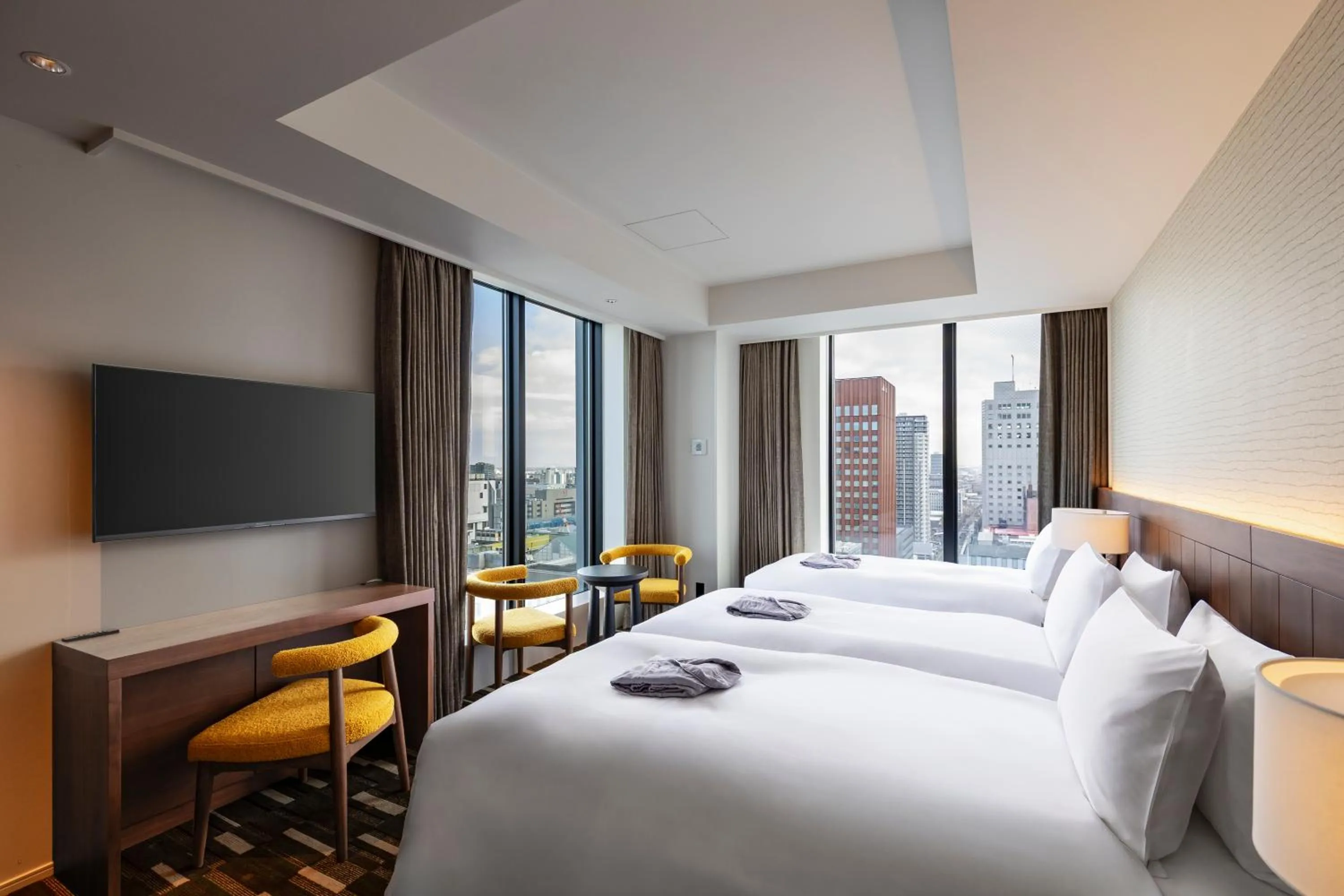 Bed in The Gate Hotel Sapporo by Hulic