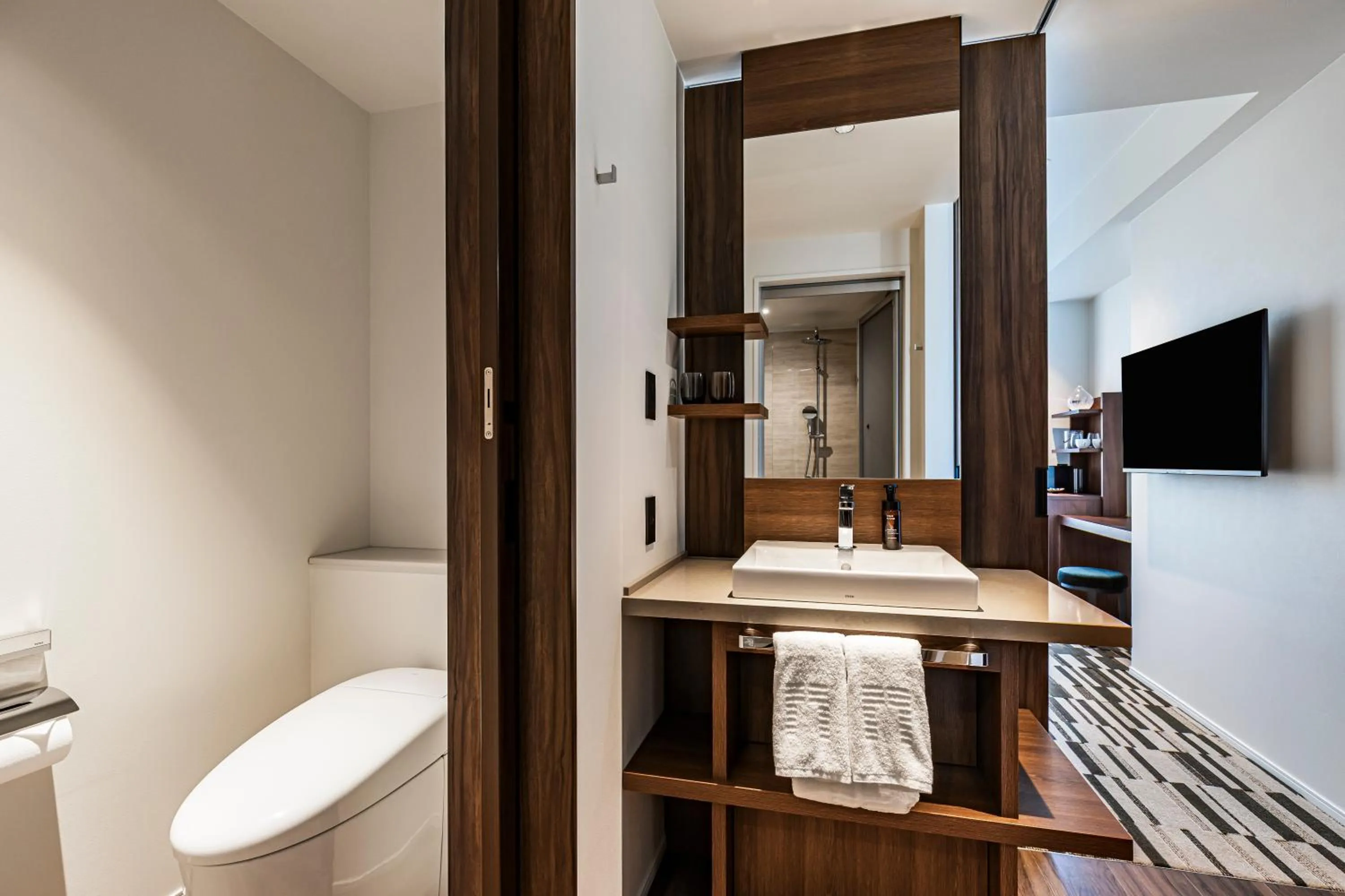 Toilet in The Gate Hotel Sapporo by Hulic