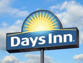 Property logo or sign in Days Inn & Suites by Wyndham South Gate