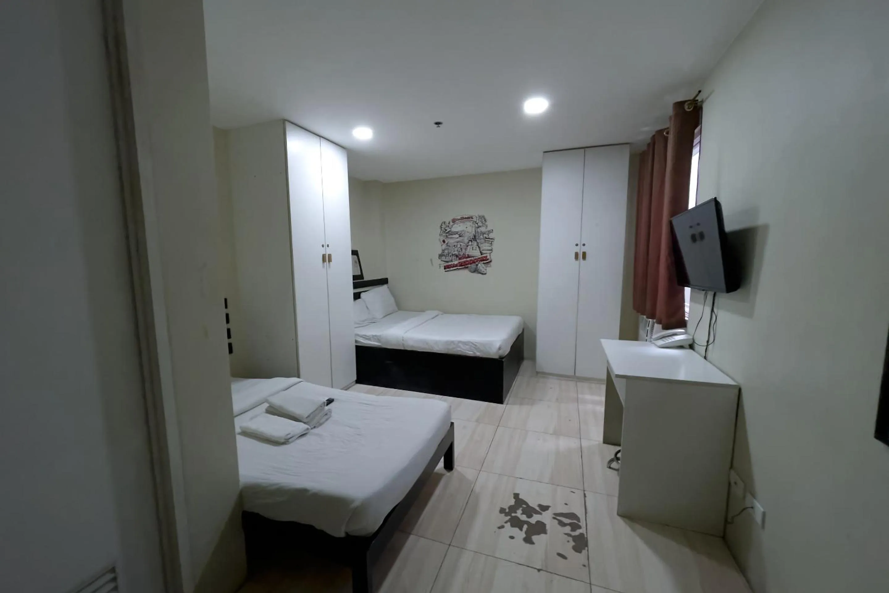 Bed in Jardin Oriental Suites Ubelt Manila