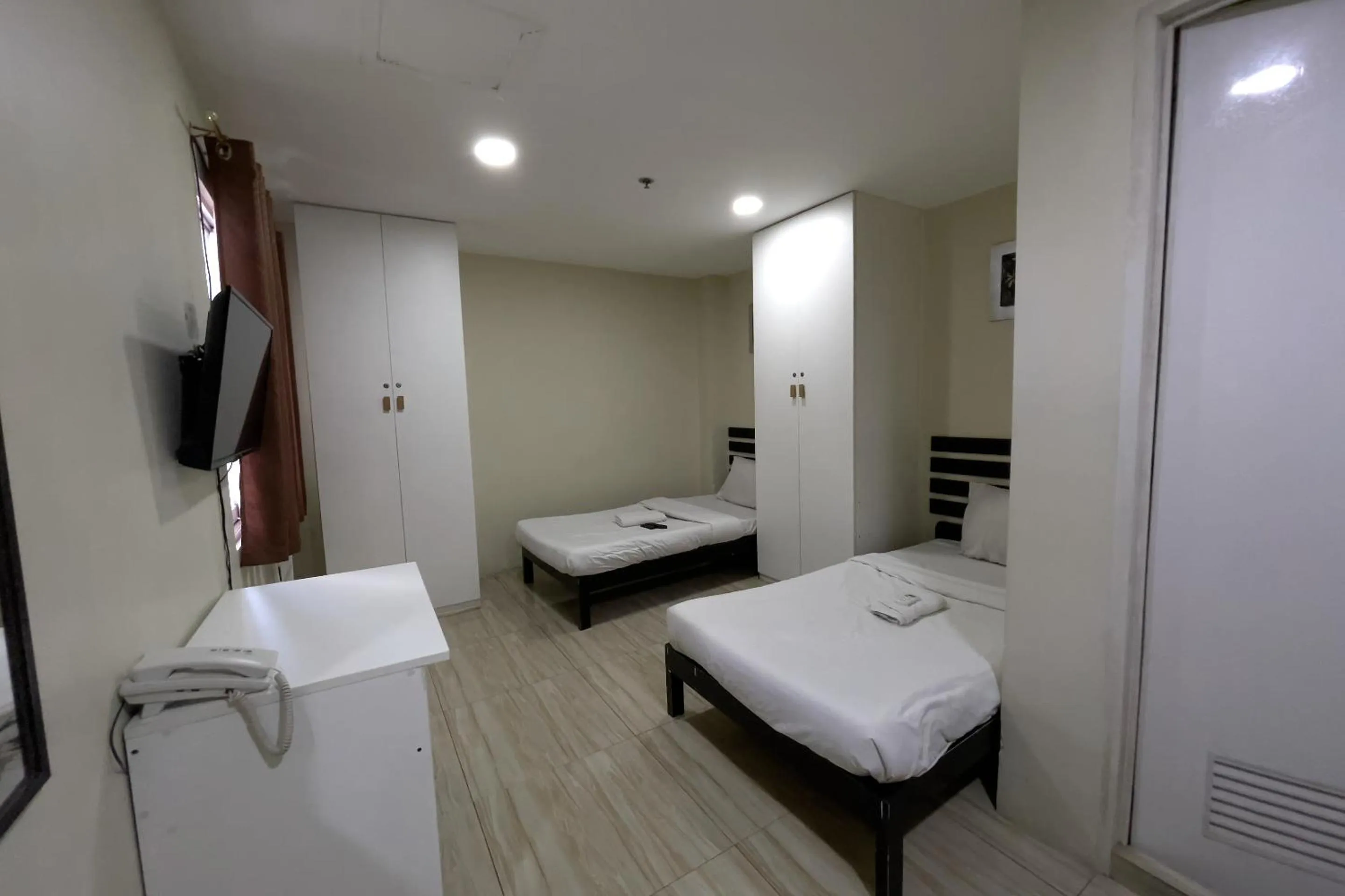 Bed in Jardin Oriental Suites Ubelt Manila