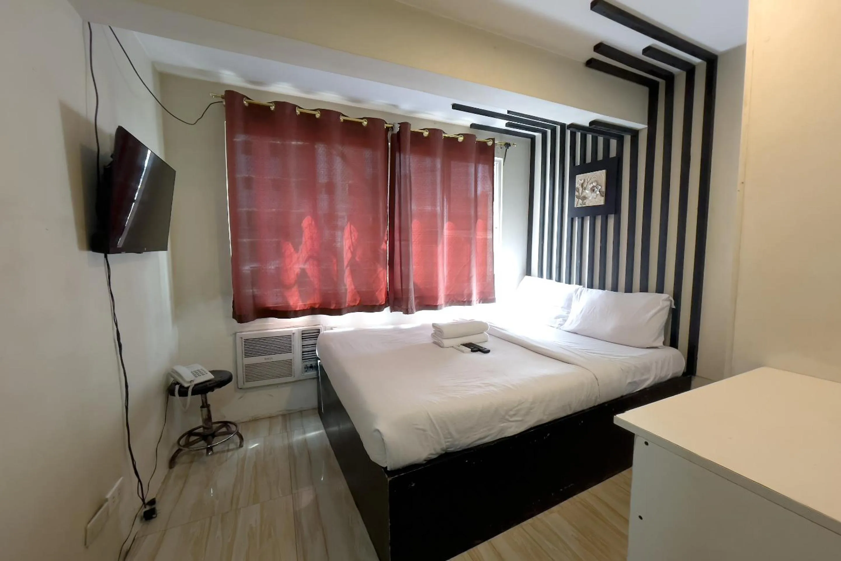 Bed in Jardin Oriental Suites Ubelt Manila