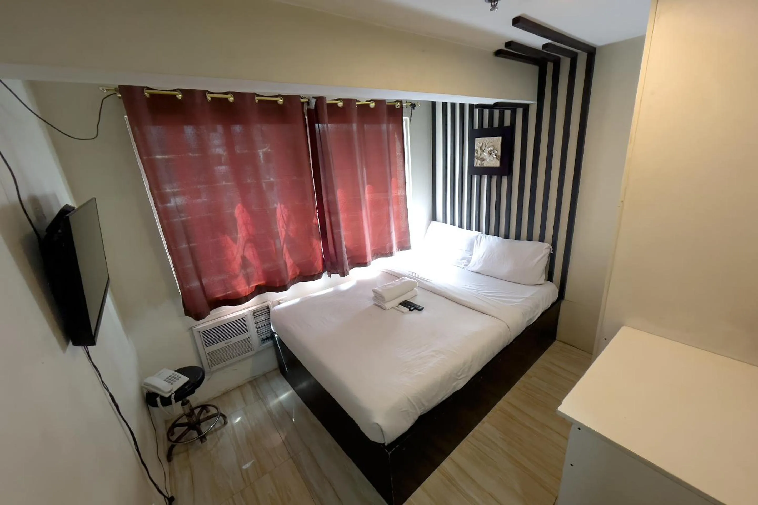 Bed in Jardin Oriental Suites Ubelt Manila