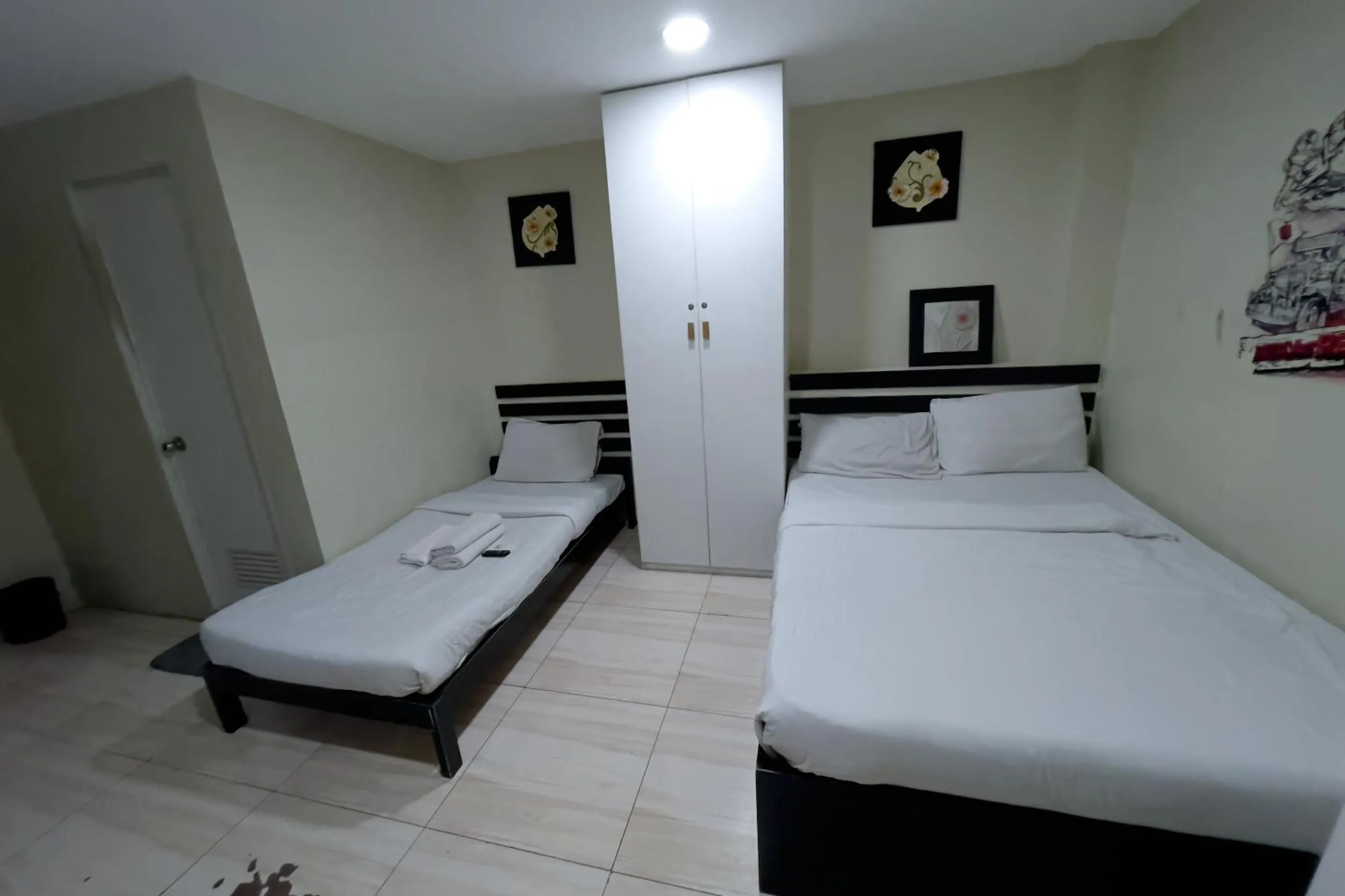 Bed in Jardin Oriental Suites Ubelt Manila