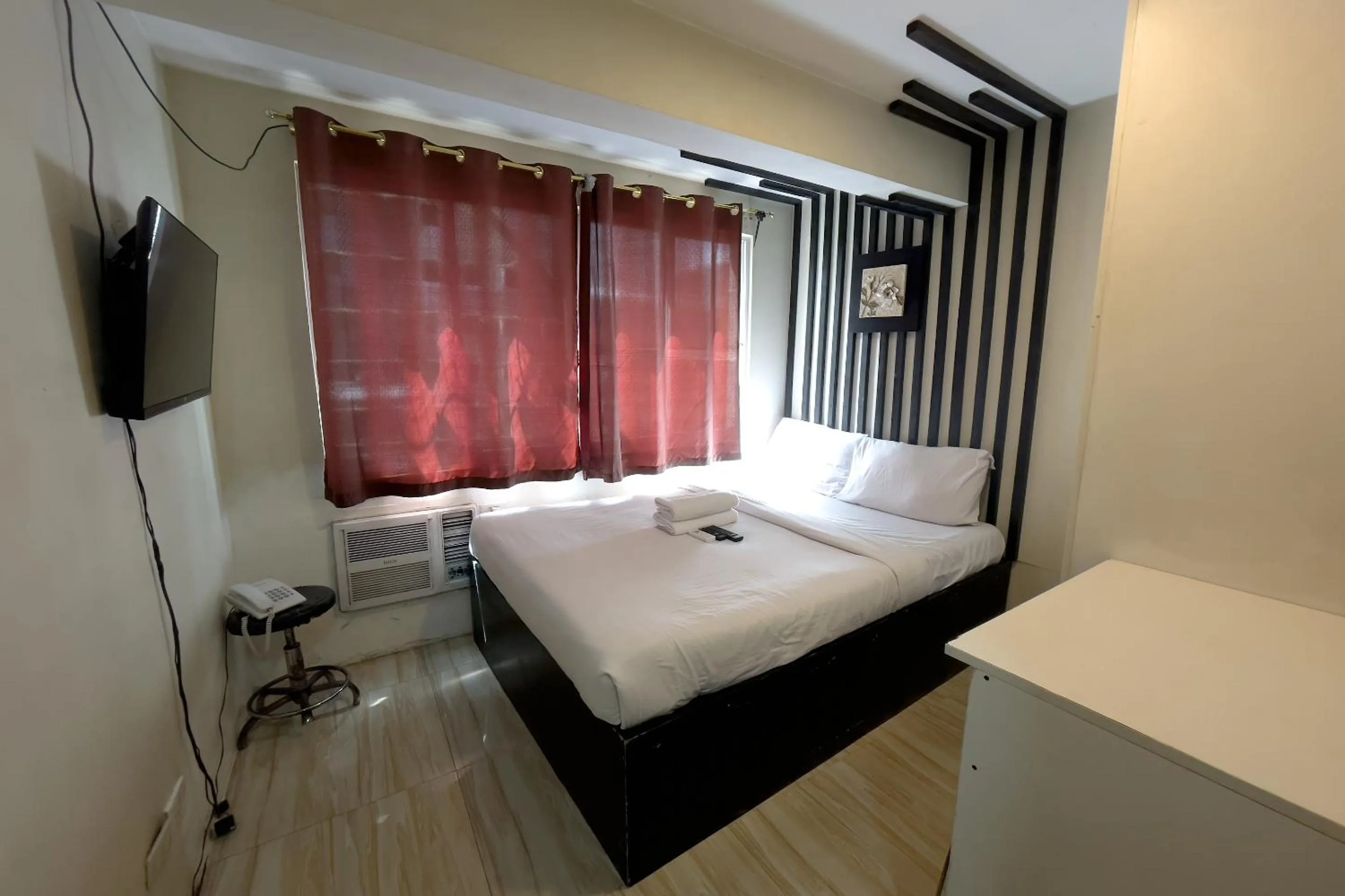 Bed in Jardin Oriental Suites Ubelt Manila