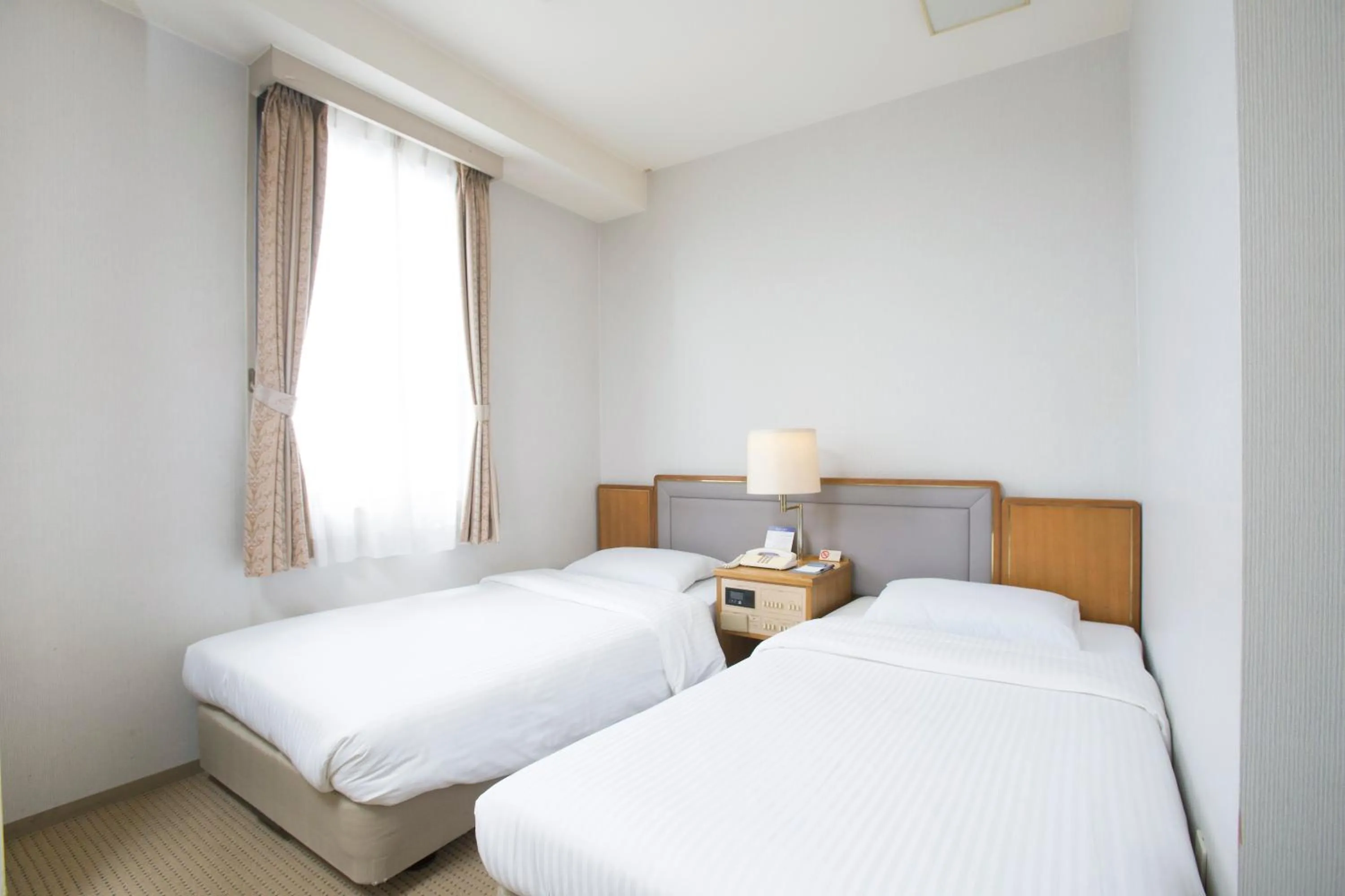 Photo of the whole room, Bed in Tetoranze Makuhari Inagekaigan Hotel