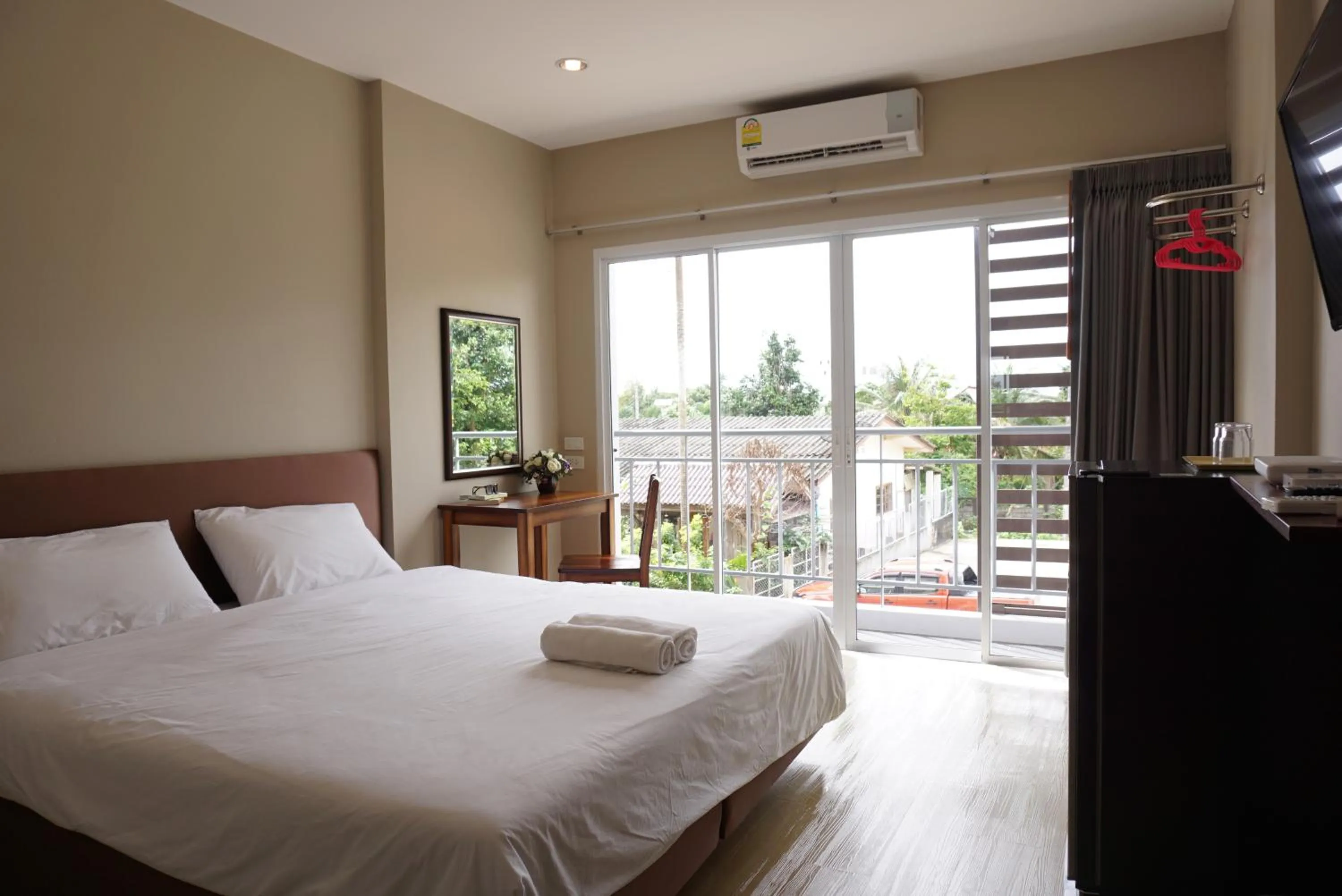 Bed in Chompu Nakarin Apartment