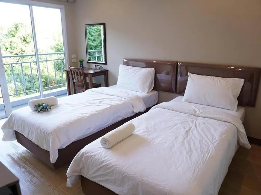 Bed in Chompu Nakarin Apartment