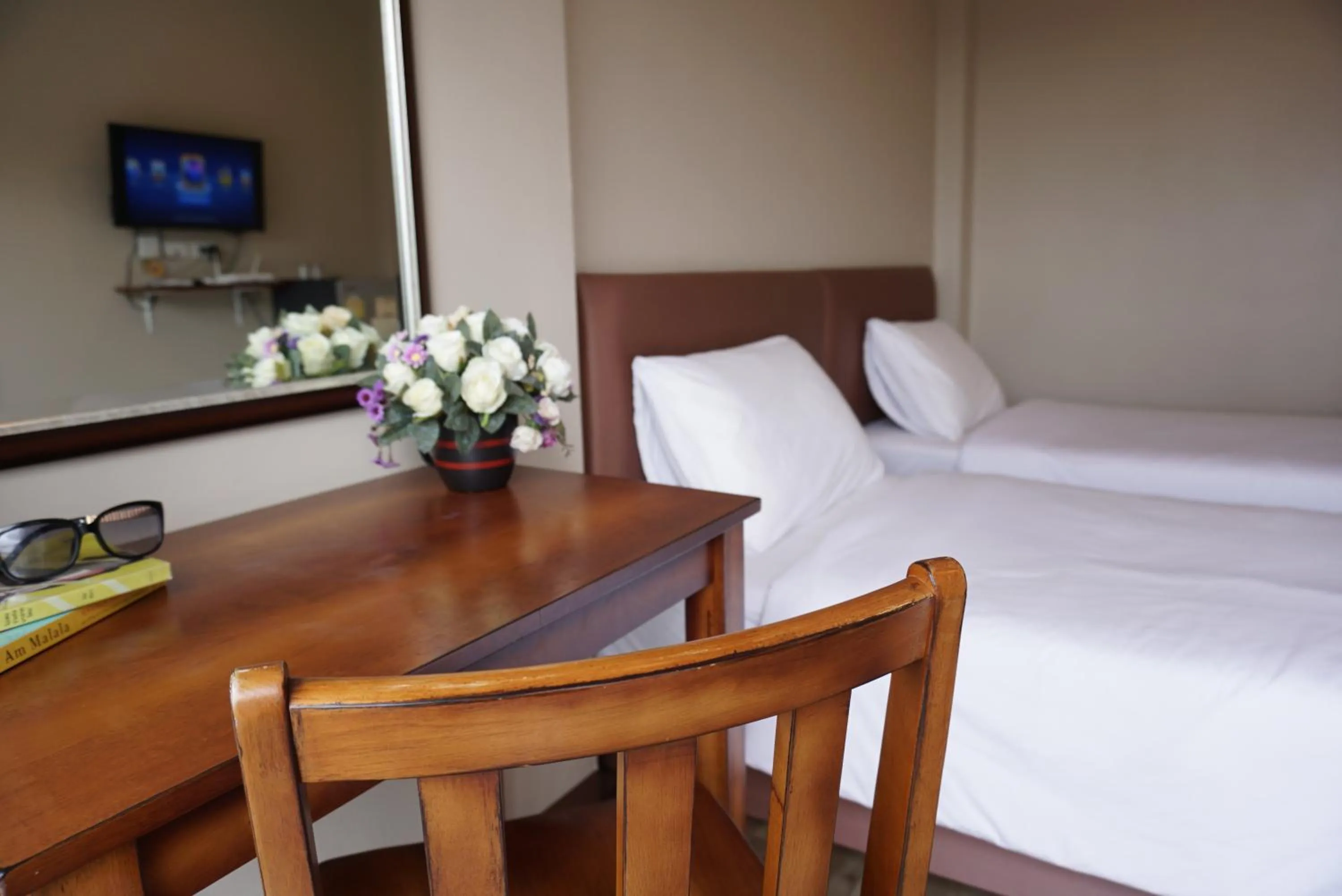 Bed in Chompu Nakarin Apartment