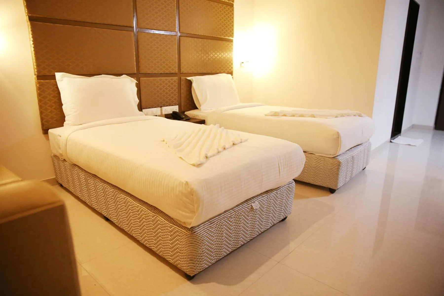 Bed in Hotel Sitara Grand Miyapur