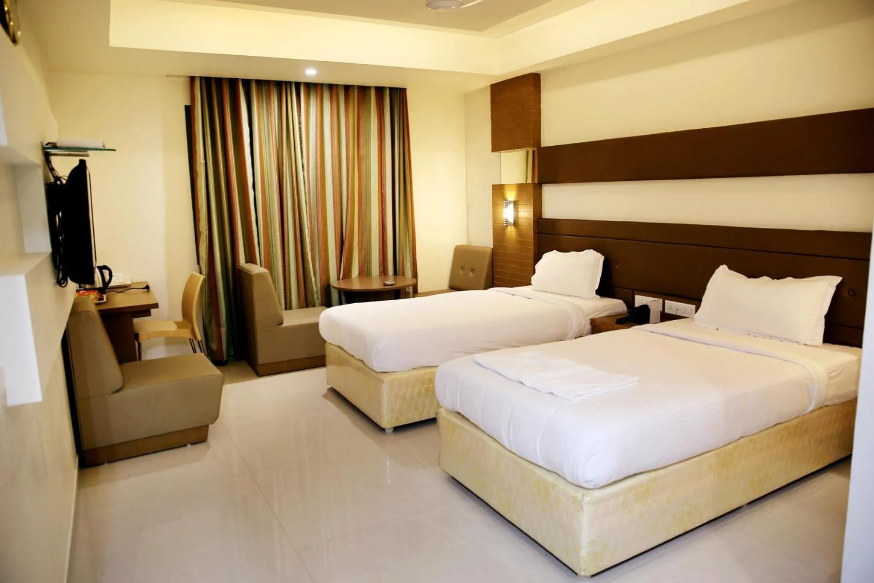 Bed in Hotel Sitara Grand Miyapur