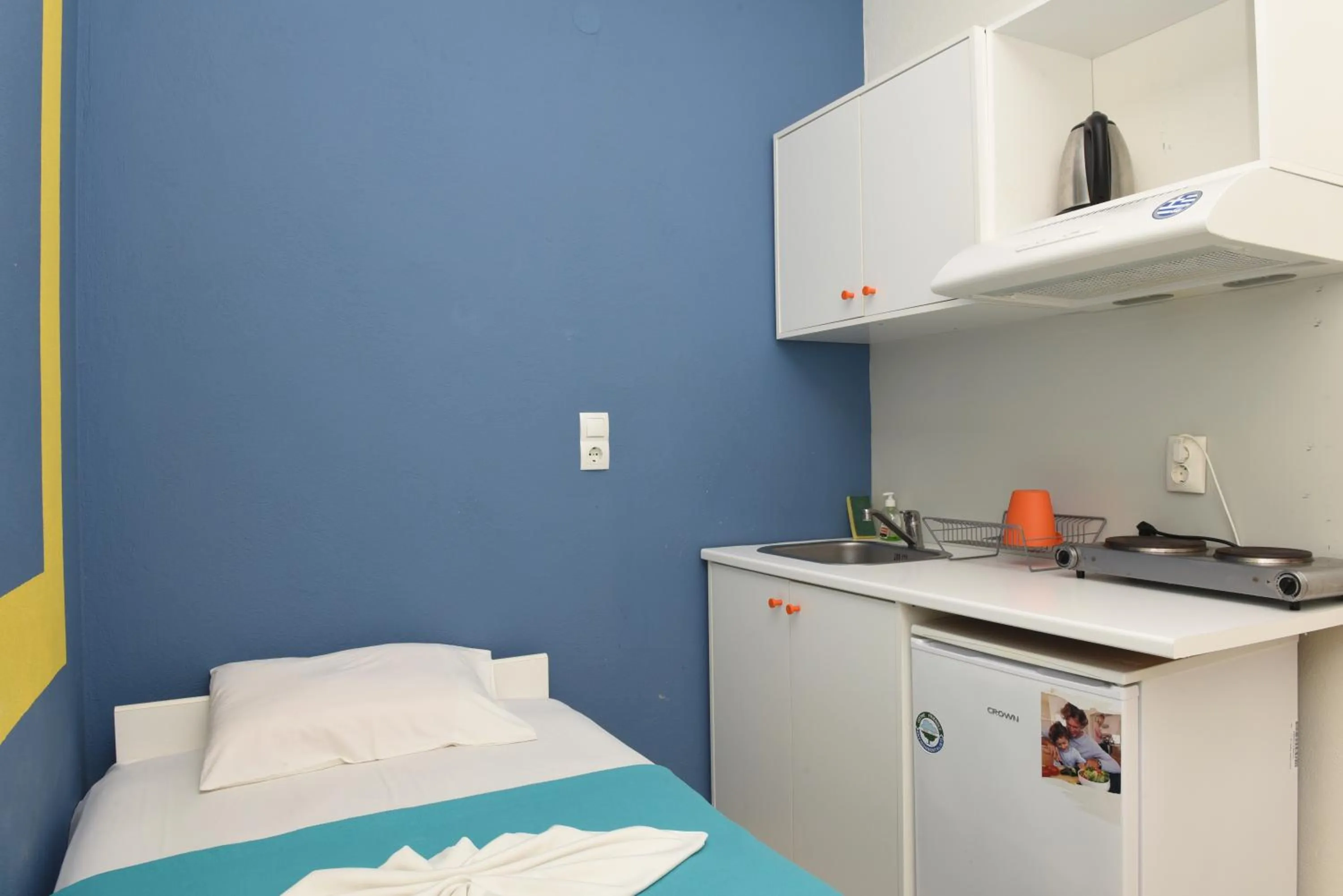 Kitchen or kitchenette, Bed in Star Beach Resort