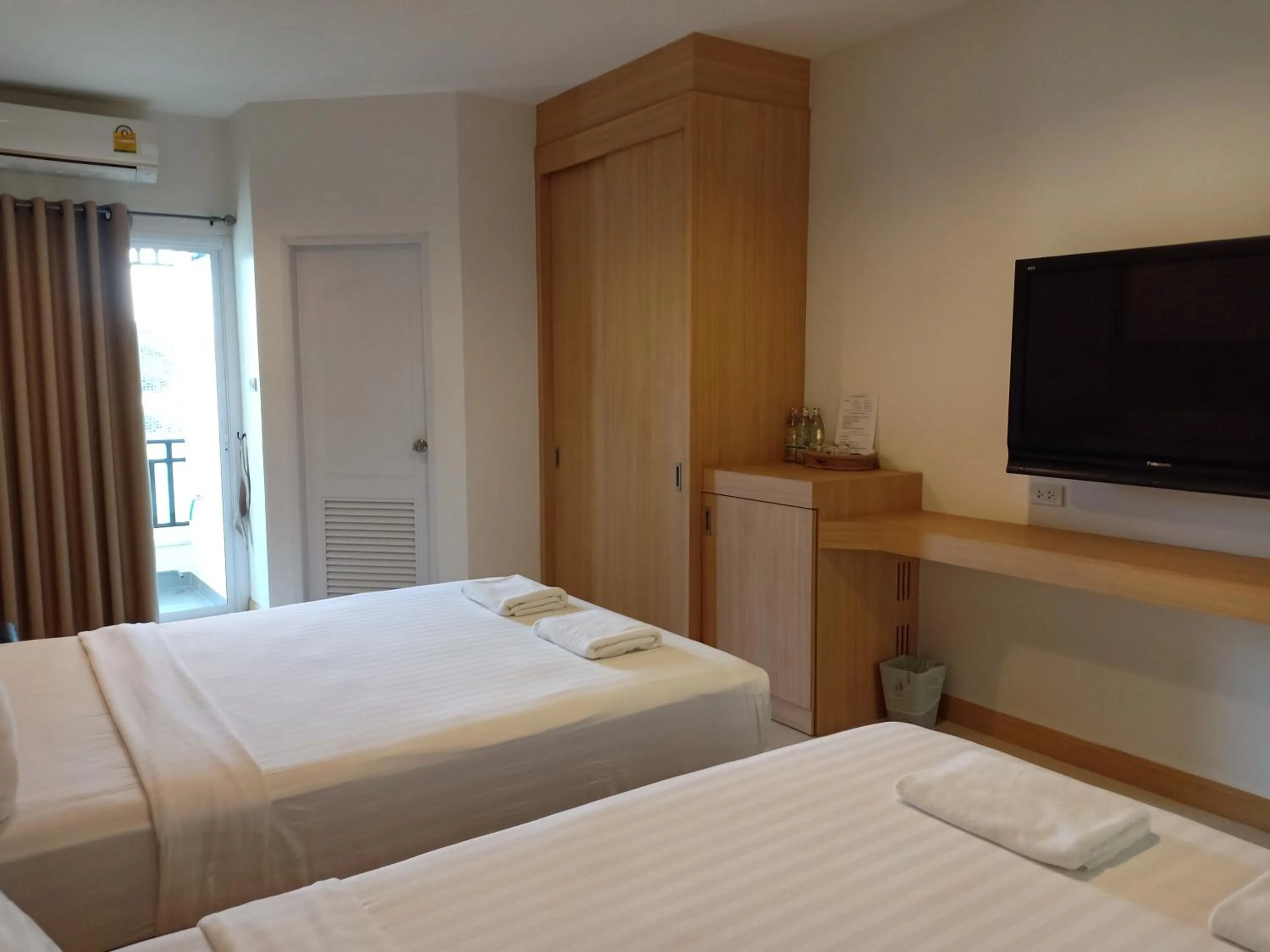 Bed in Fortune Surin Hotel