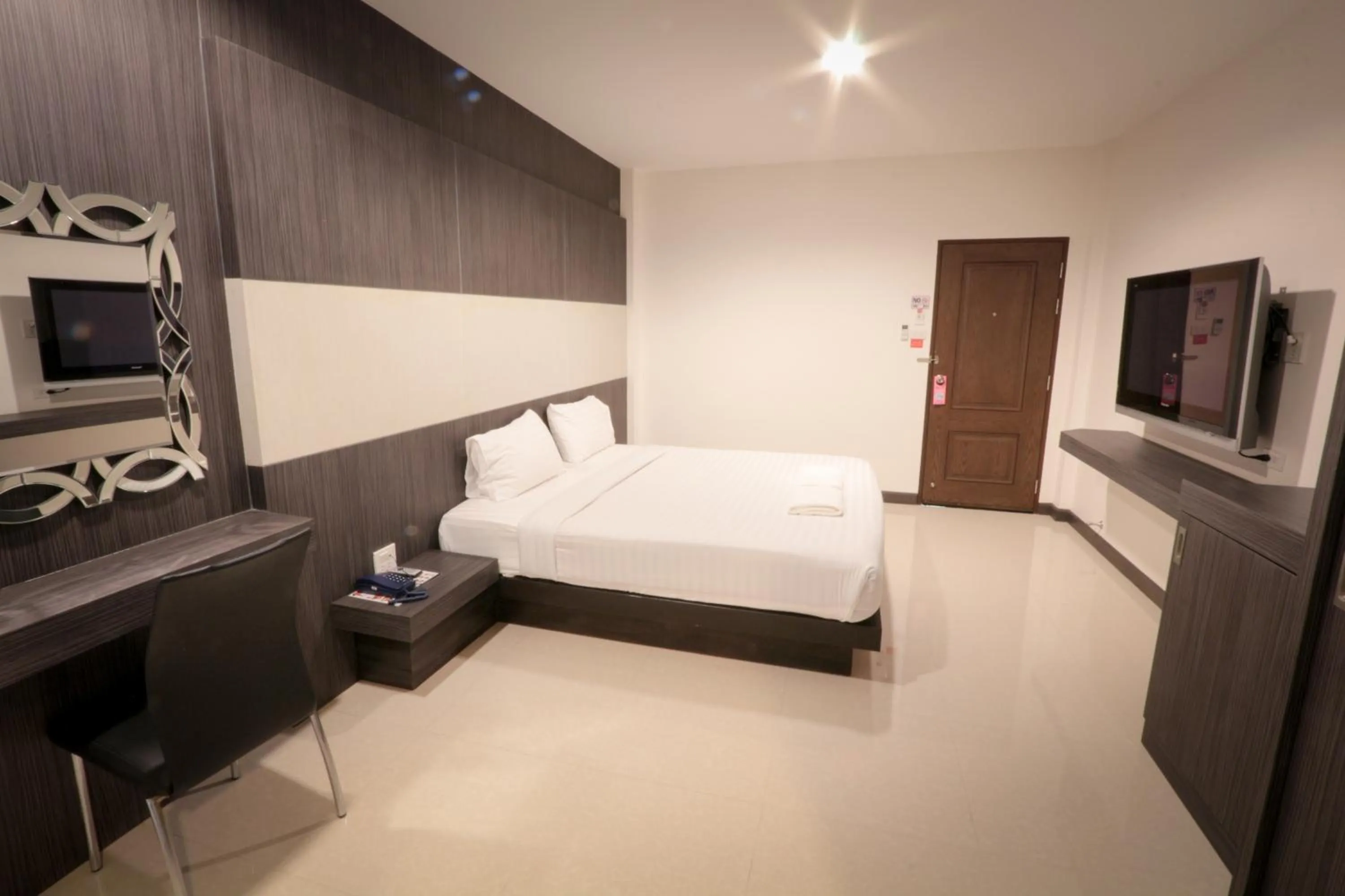 Bed in Fortune Surin Hotel