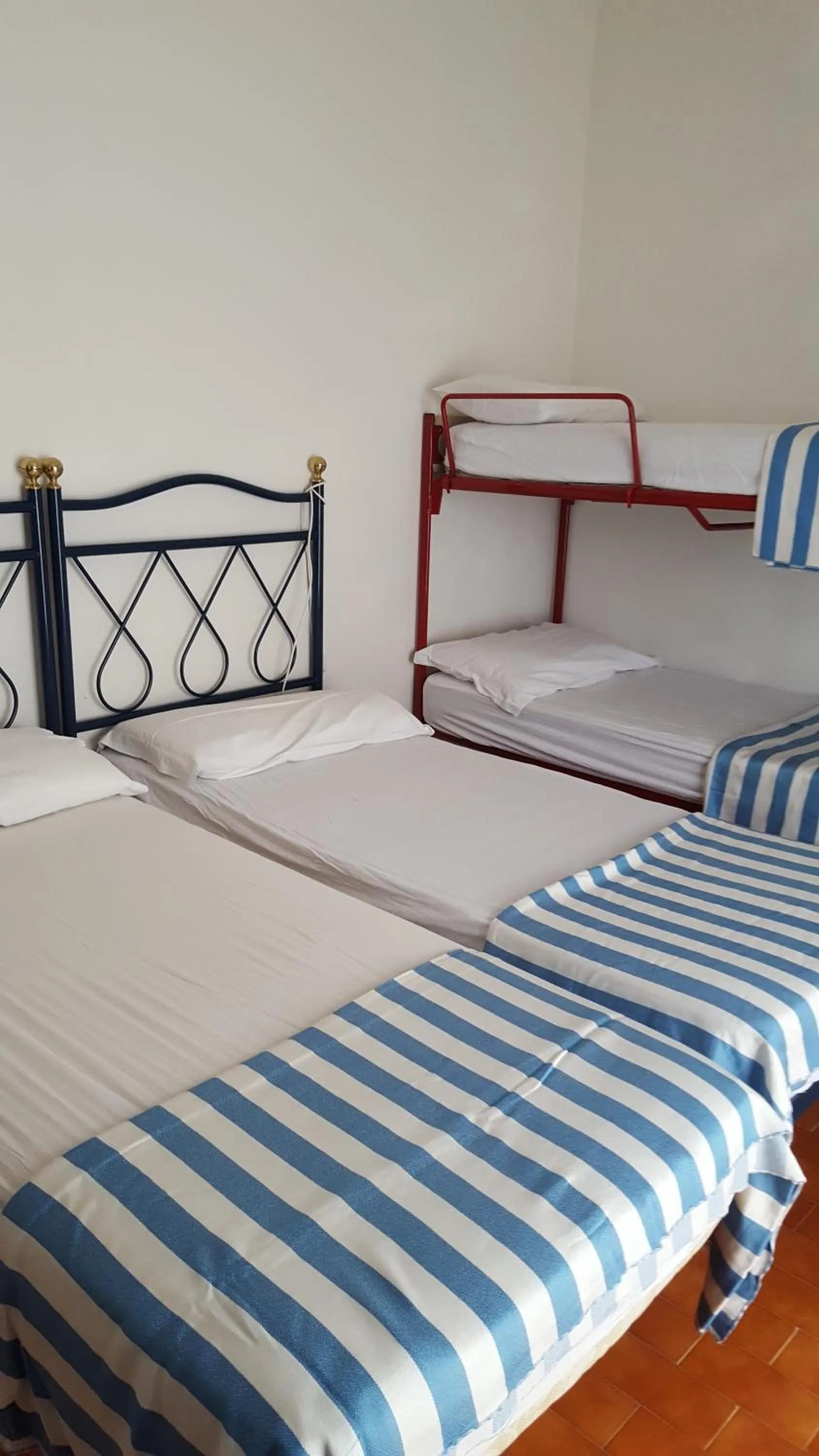 Bed in RESIDENCE GALLO - WALTERIGATO Apartments PER SOLO FAMIGLIE