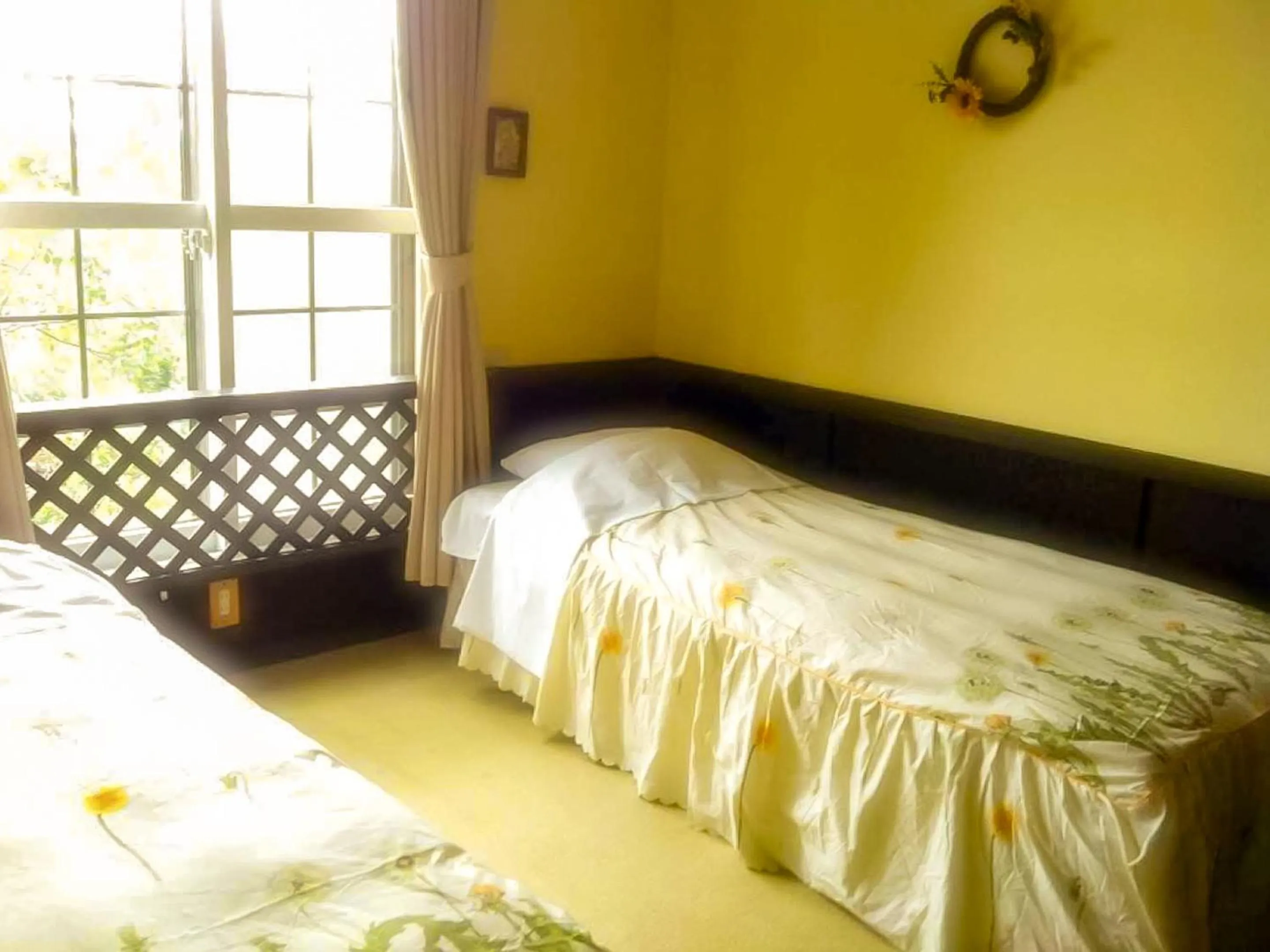 Bed in Pension Wildflowers