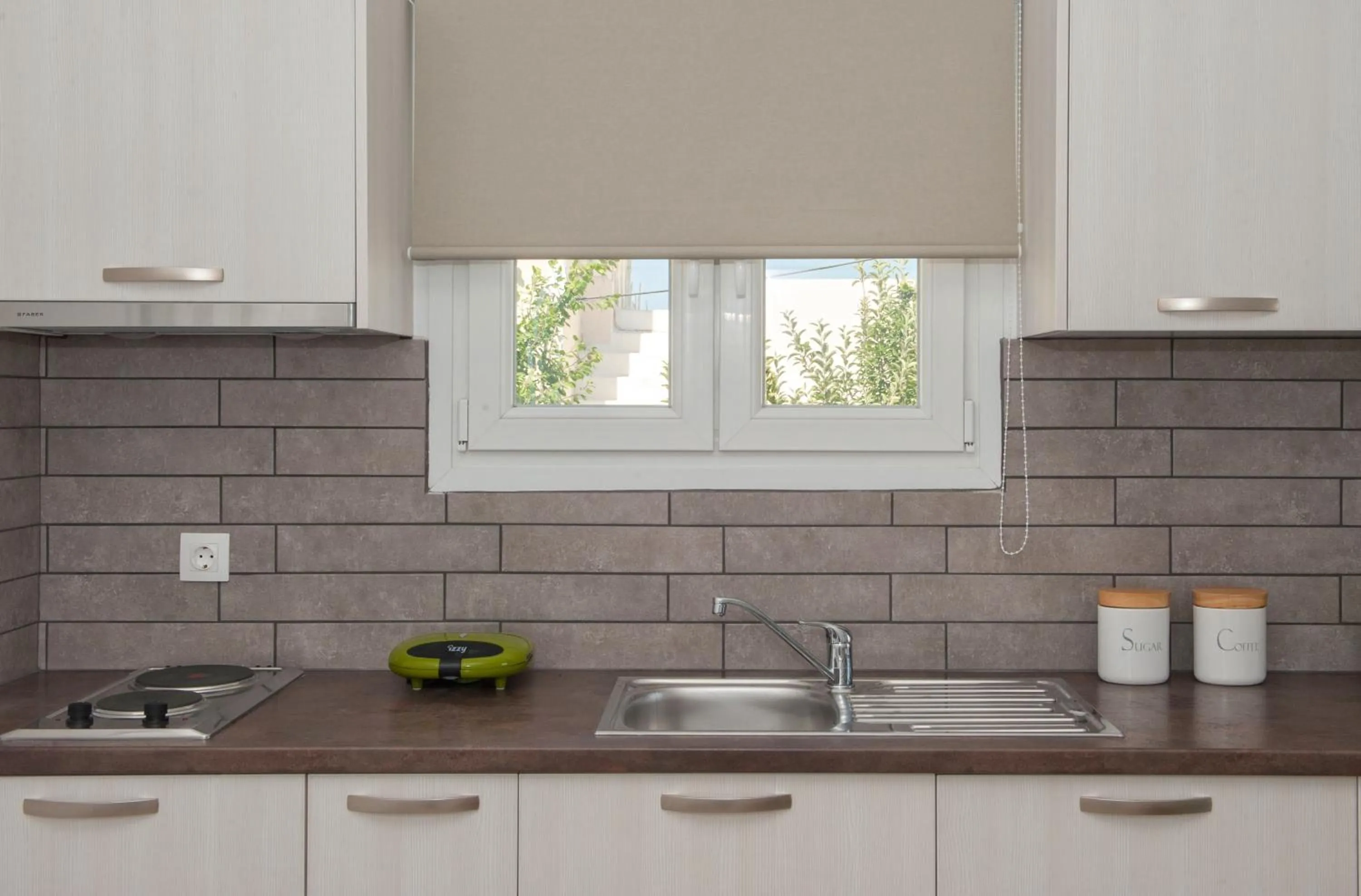 Kitchen or kitchenette in Altea Apartments