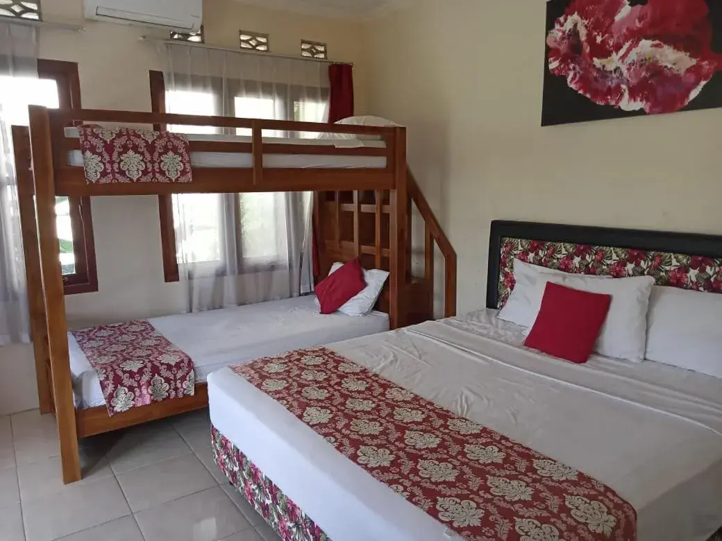 Bed in Rosella Cottages - Homestay - Yogyakarta Bed in Rosella Cottages - Homestay - Yogyakarta